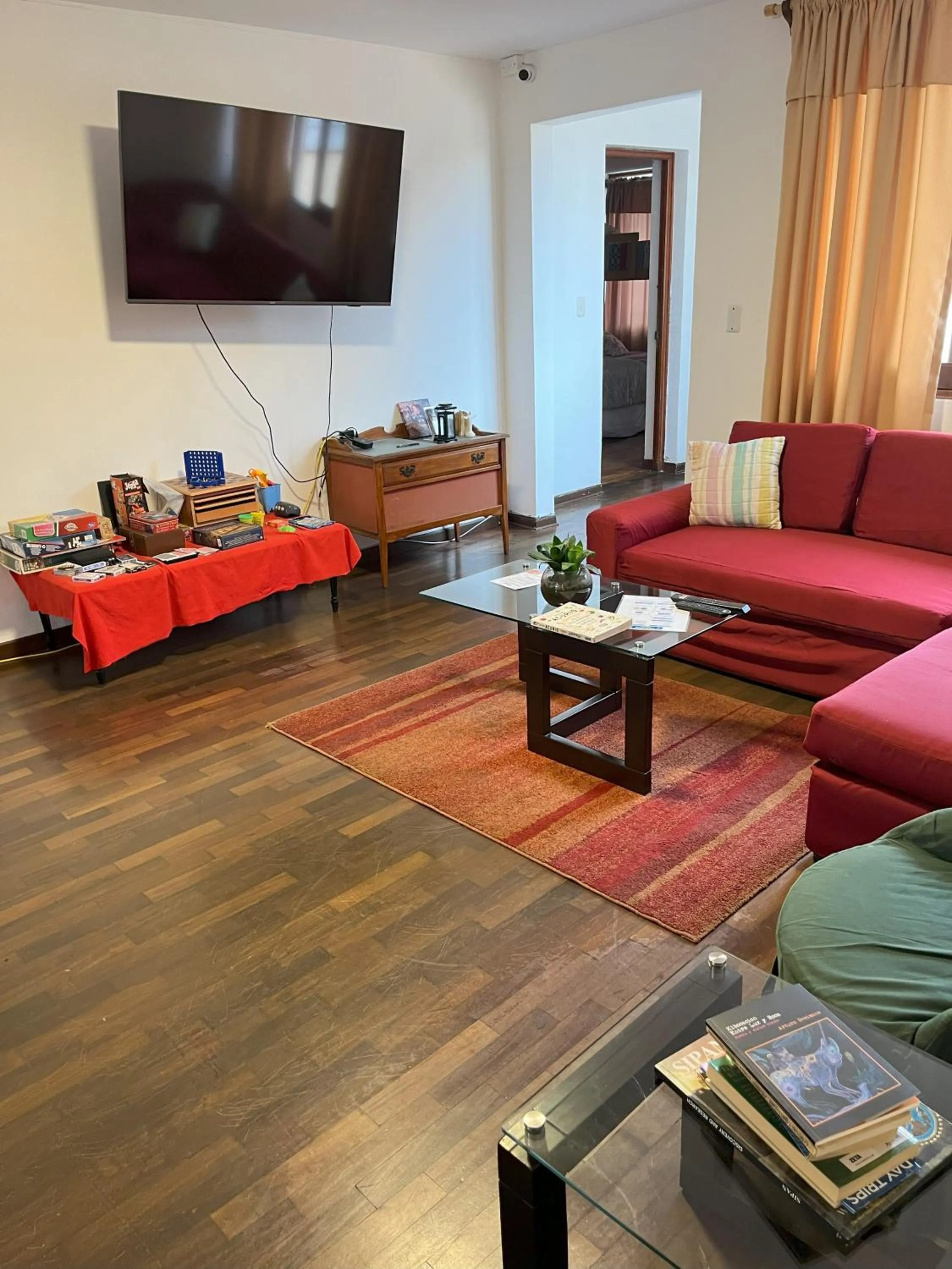 Communal lounge/ TV room, Bed in Harmony Inn Miraflores