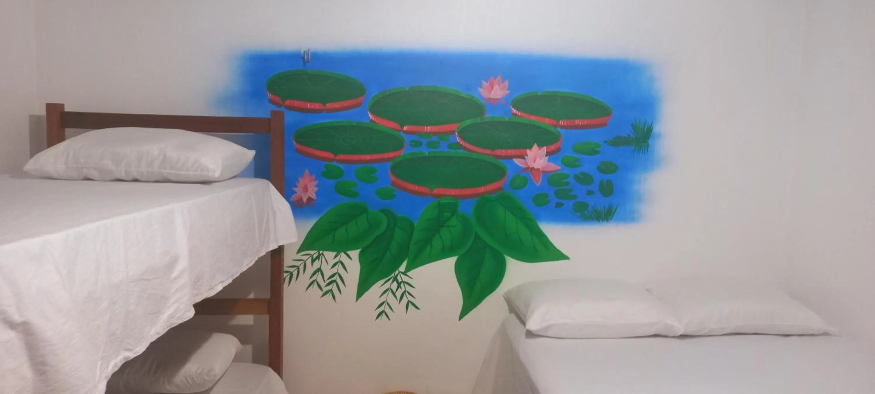 Bed in Pousada Angatu alter