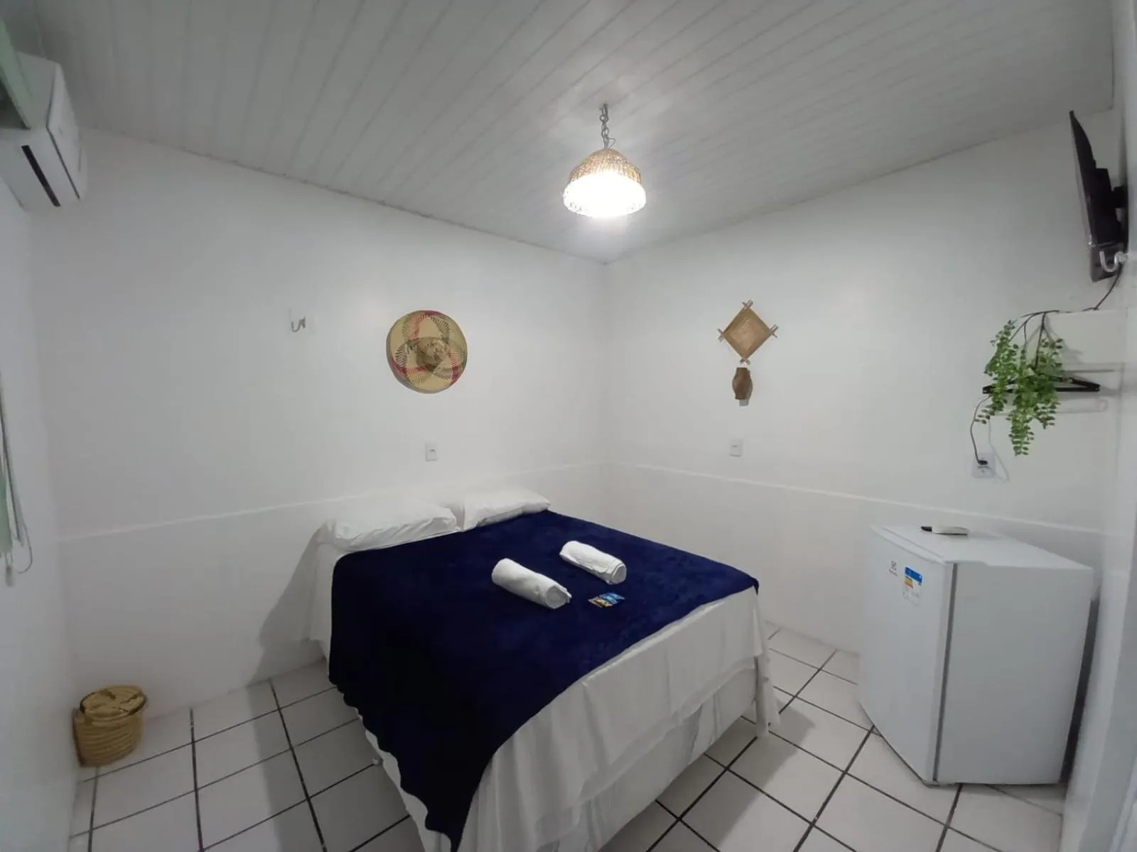 Bed in Pousada Angatu alter