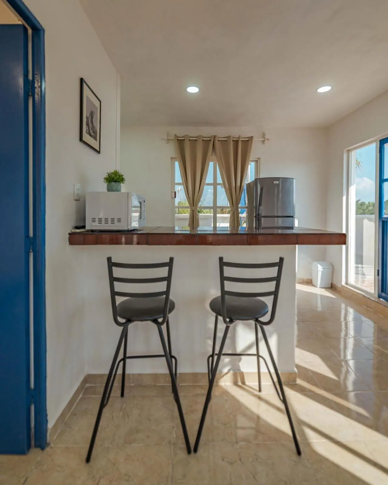 Kitchen or kitchenette in Suites Ha