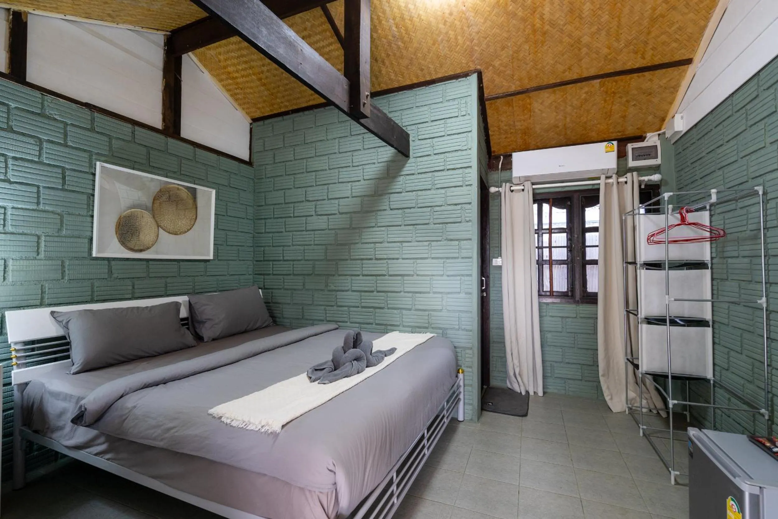 Bed in Breeze Bungalows