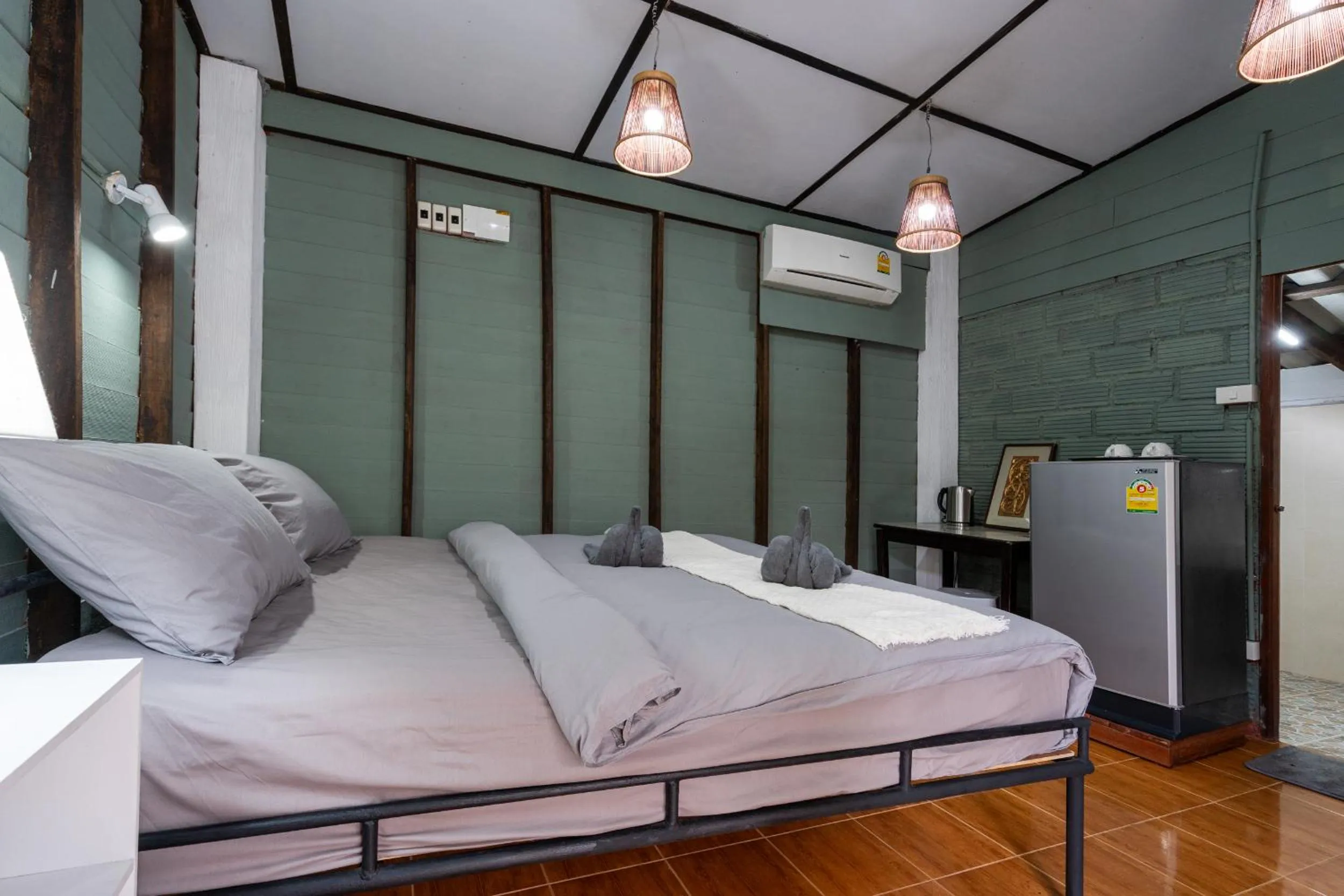 Bed in Breeze Bungalows