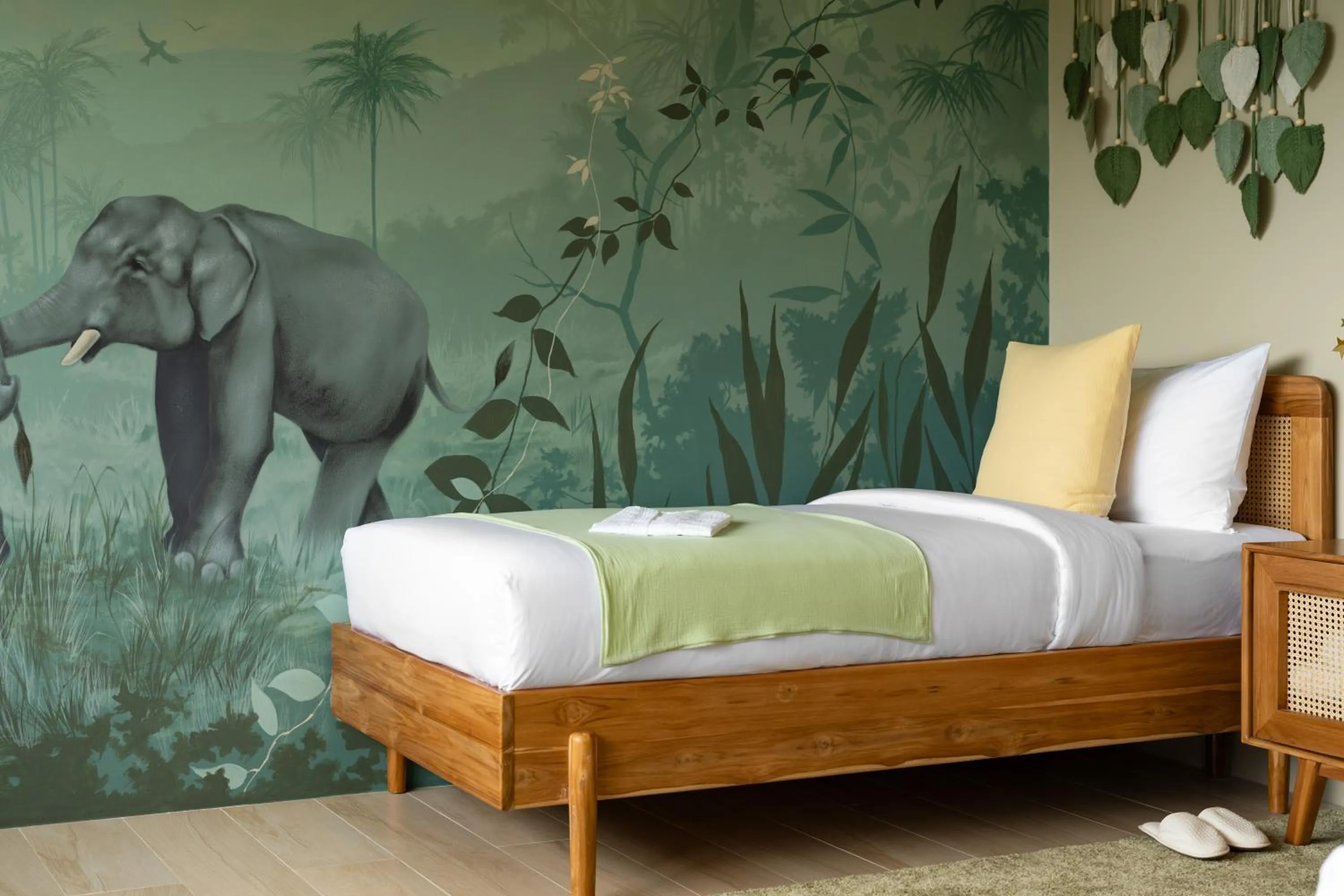 Bed in Wild Cottages Elephant Sanctuary Resort