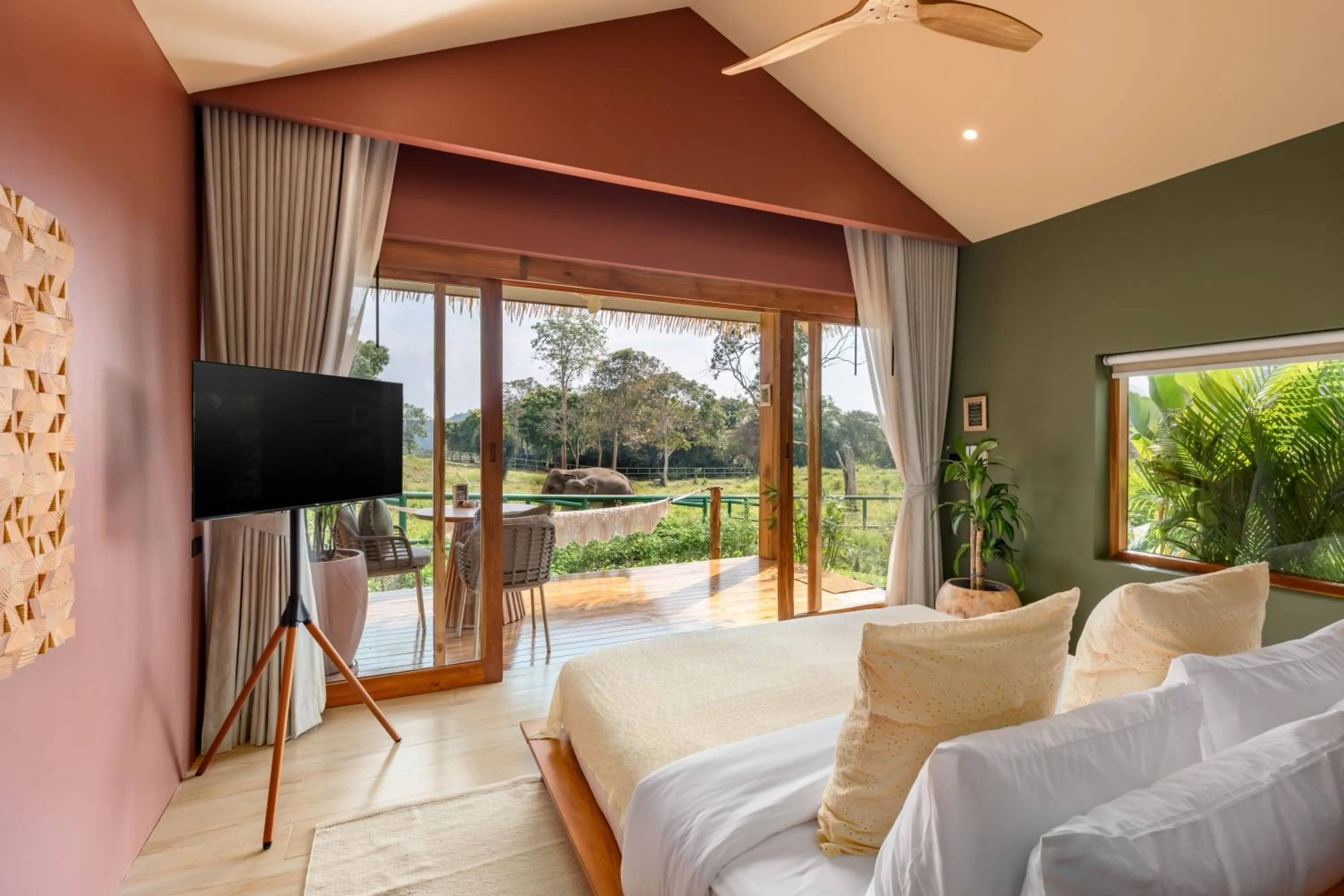 Bed in Wild Cottages Elephant Sanctuary Resort