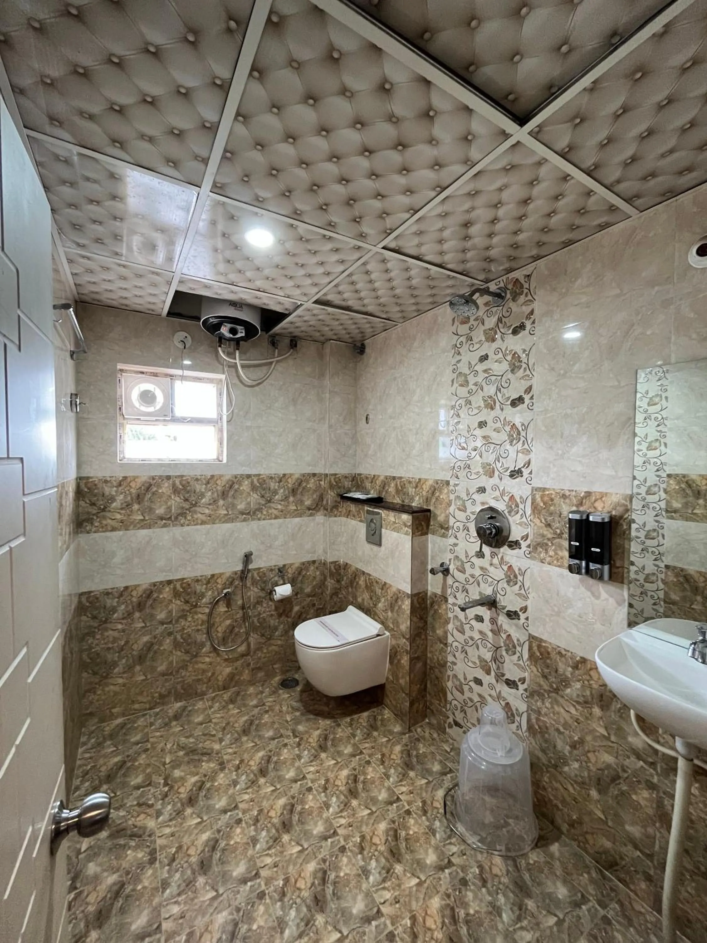 Shower in Hotel Avenue Suites Near International Airport Bangalore