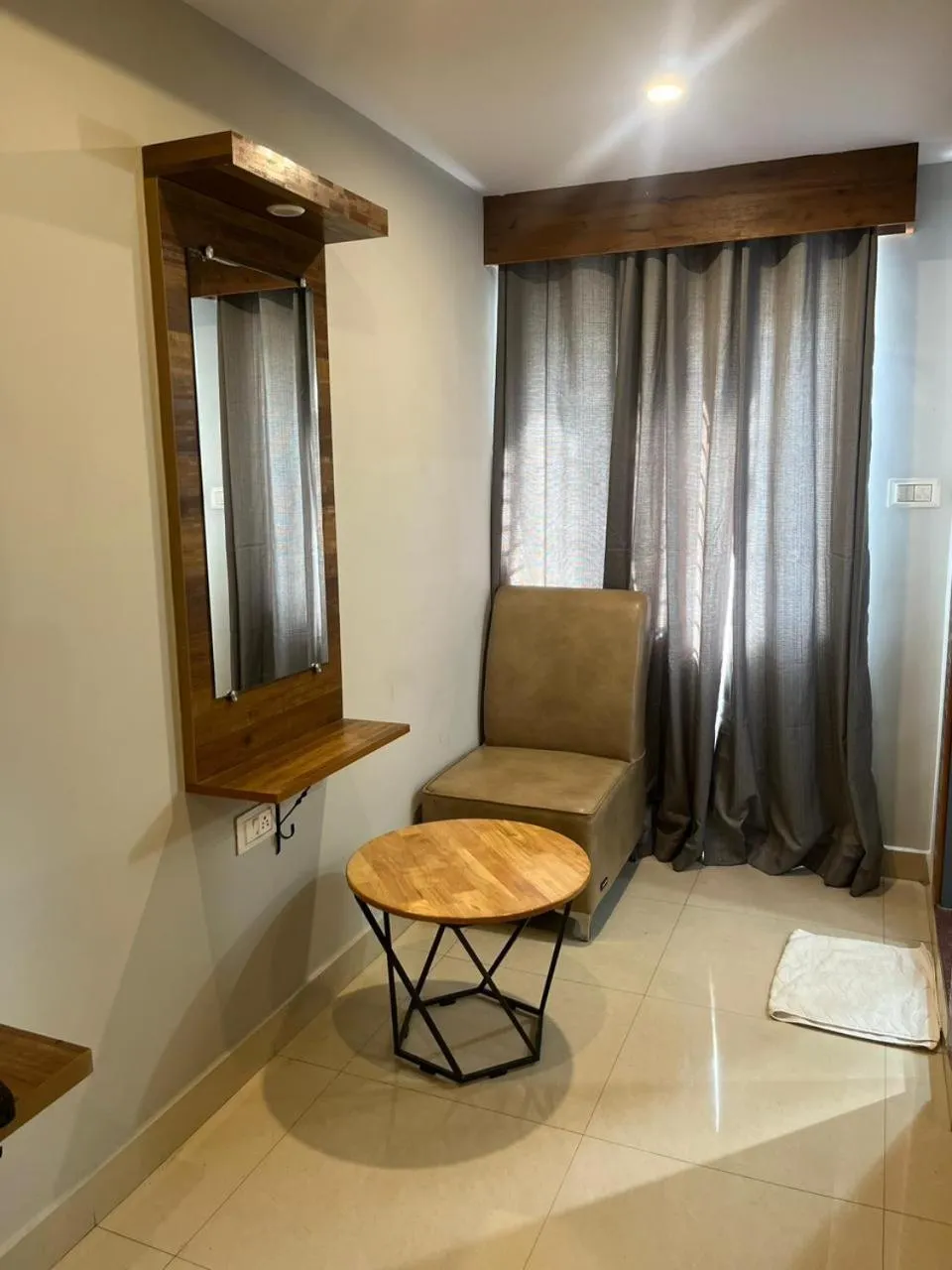 Seating area in Hotel Avenue Suites Near International Airport Bangalore