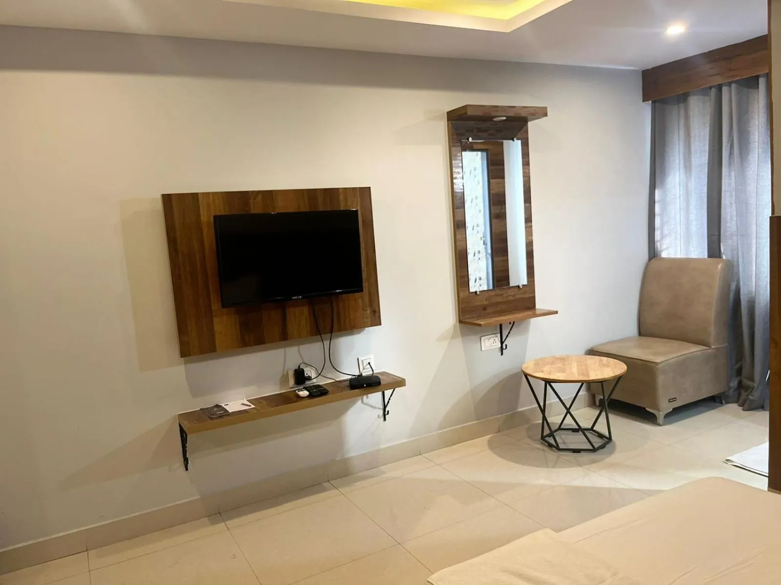 TV and multimedia in Hotel Avenue Suites Near International Airport Bangalore