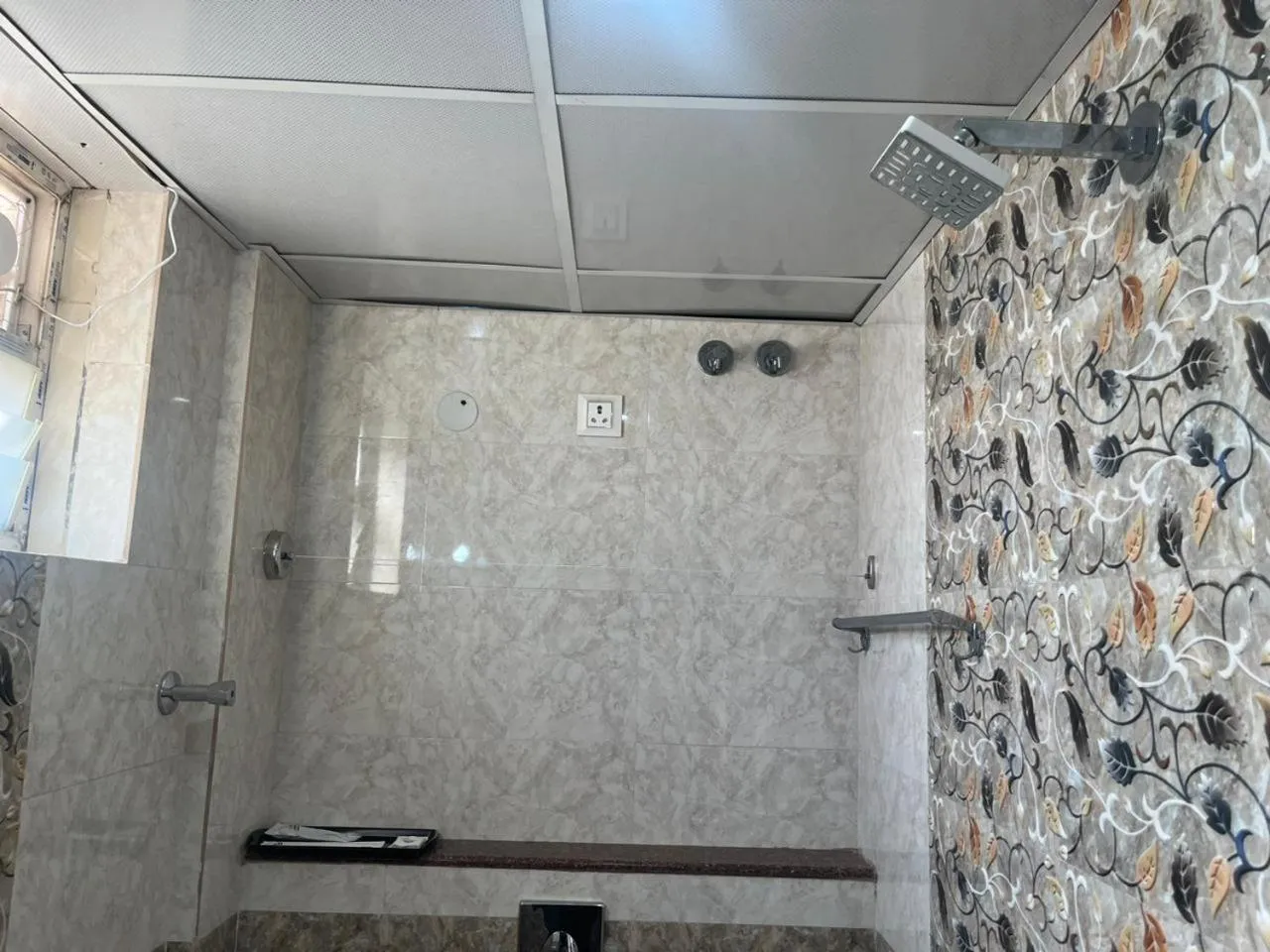 Shower in Hotel Avenue Suites Near International Airport Bangalore