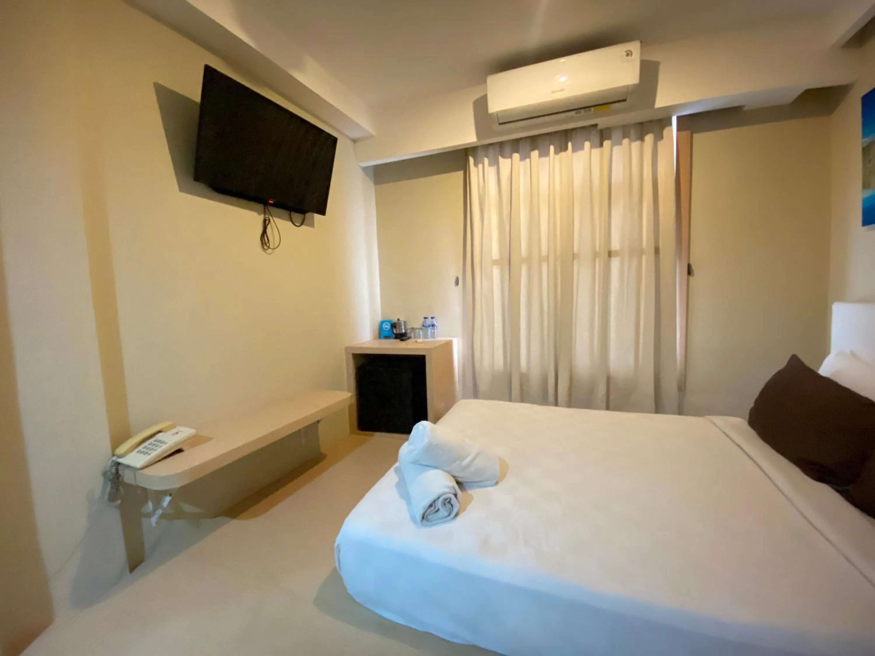 Bed in Kimono Spa Hotel