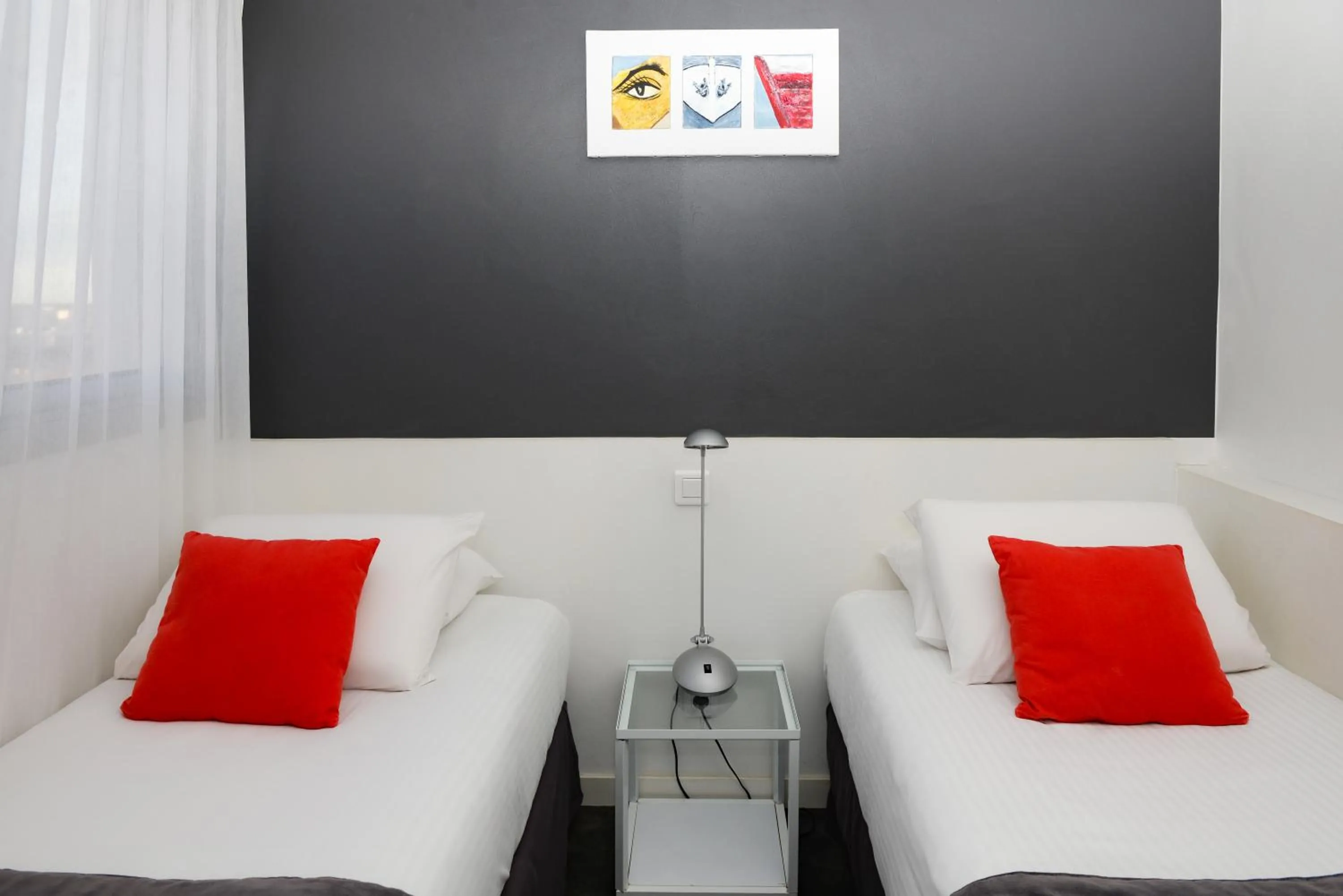 Bedroom in Kyriad Prestige Les Sables d'Olonne - Plage - Centre des Congrès