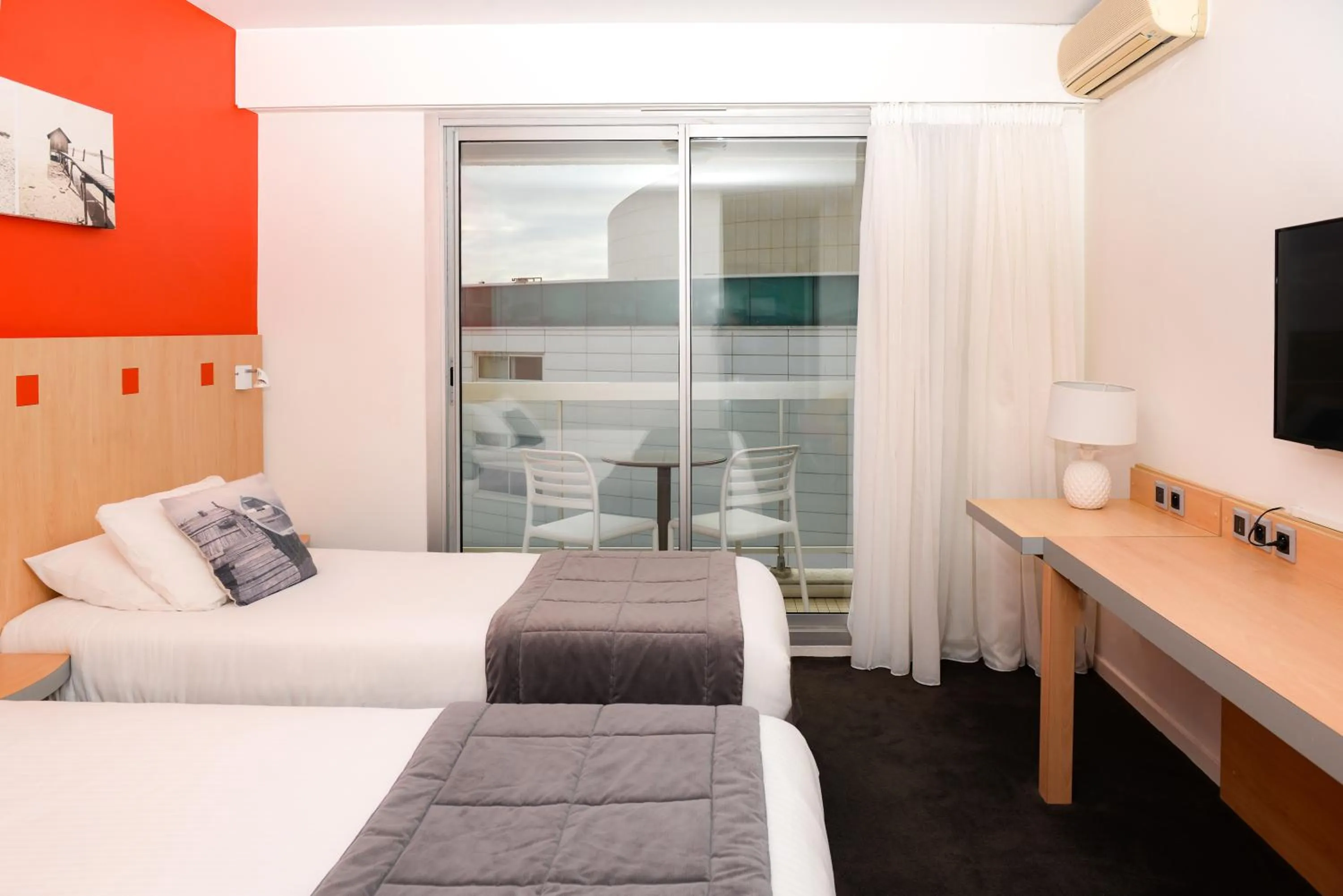 Photo of the whole room, Bed in Kyriad Prestige Les Sables d'Olonne - Plage - Centre des Congrès