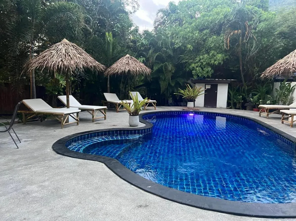 Swimming pool in Tropical Village Resort
