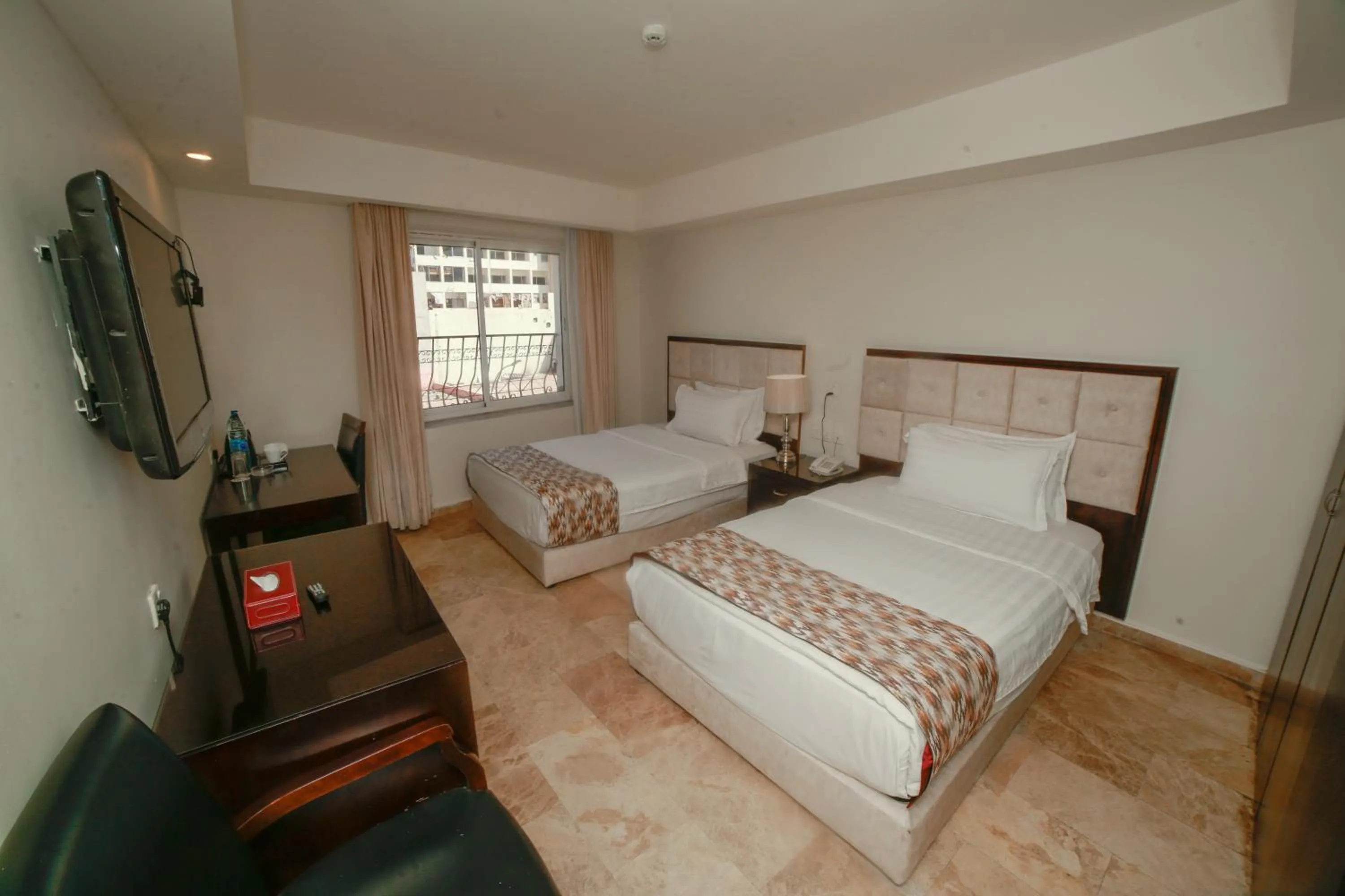 TV and multimedia, Bed in Yafko Hotel