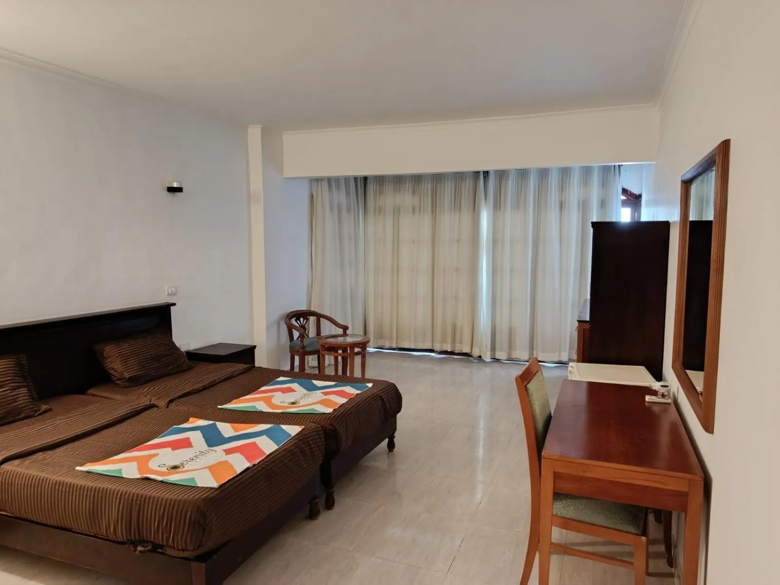 Photo of the whole room, Bed in Serenity Lodge