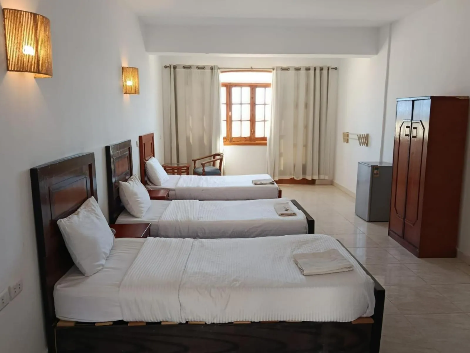 Photo of the whole room, Bed in Serenity Lodge