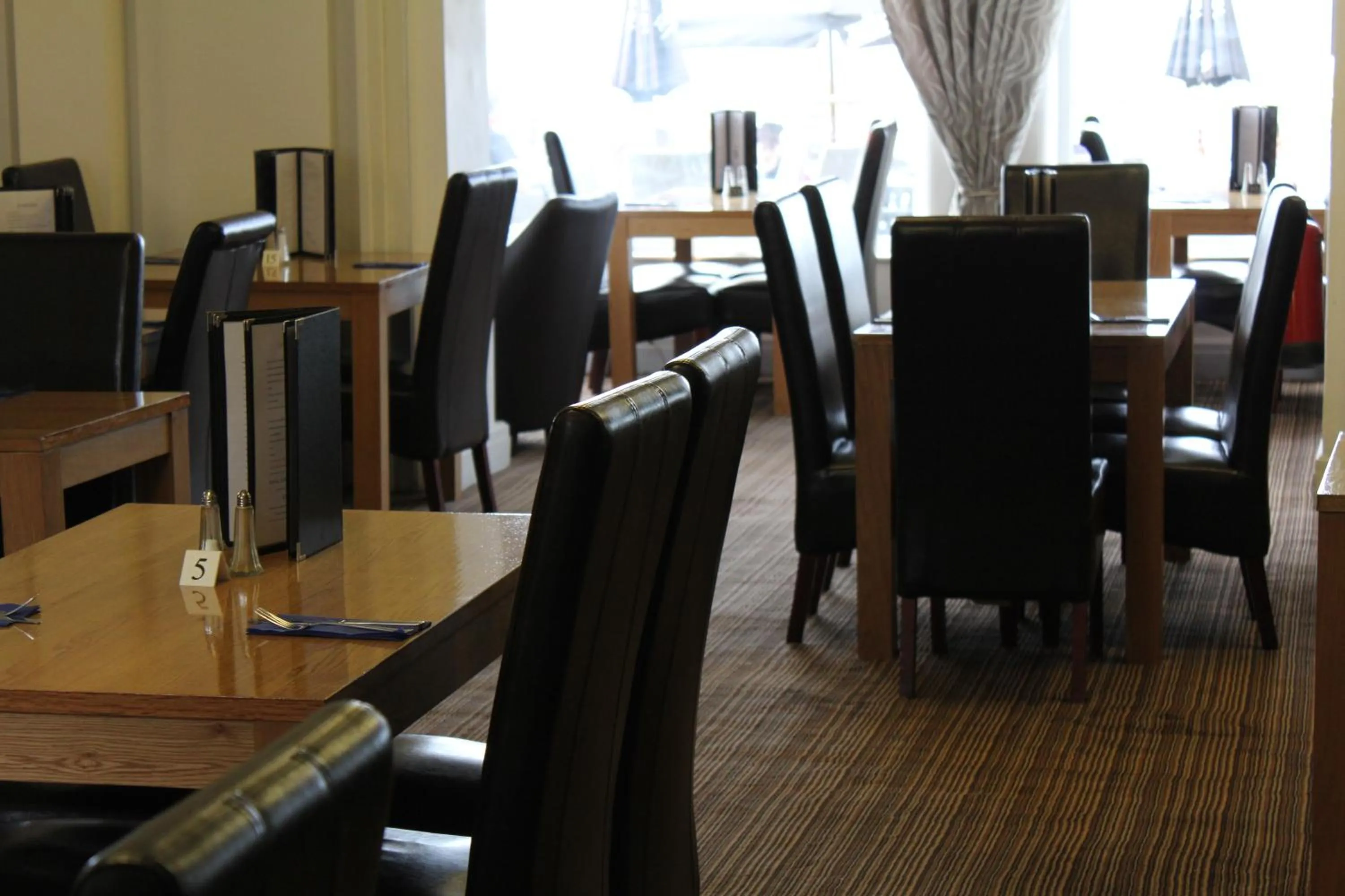 Dining area in Royal Carlton Hotel
