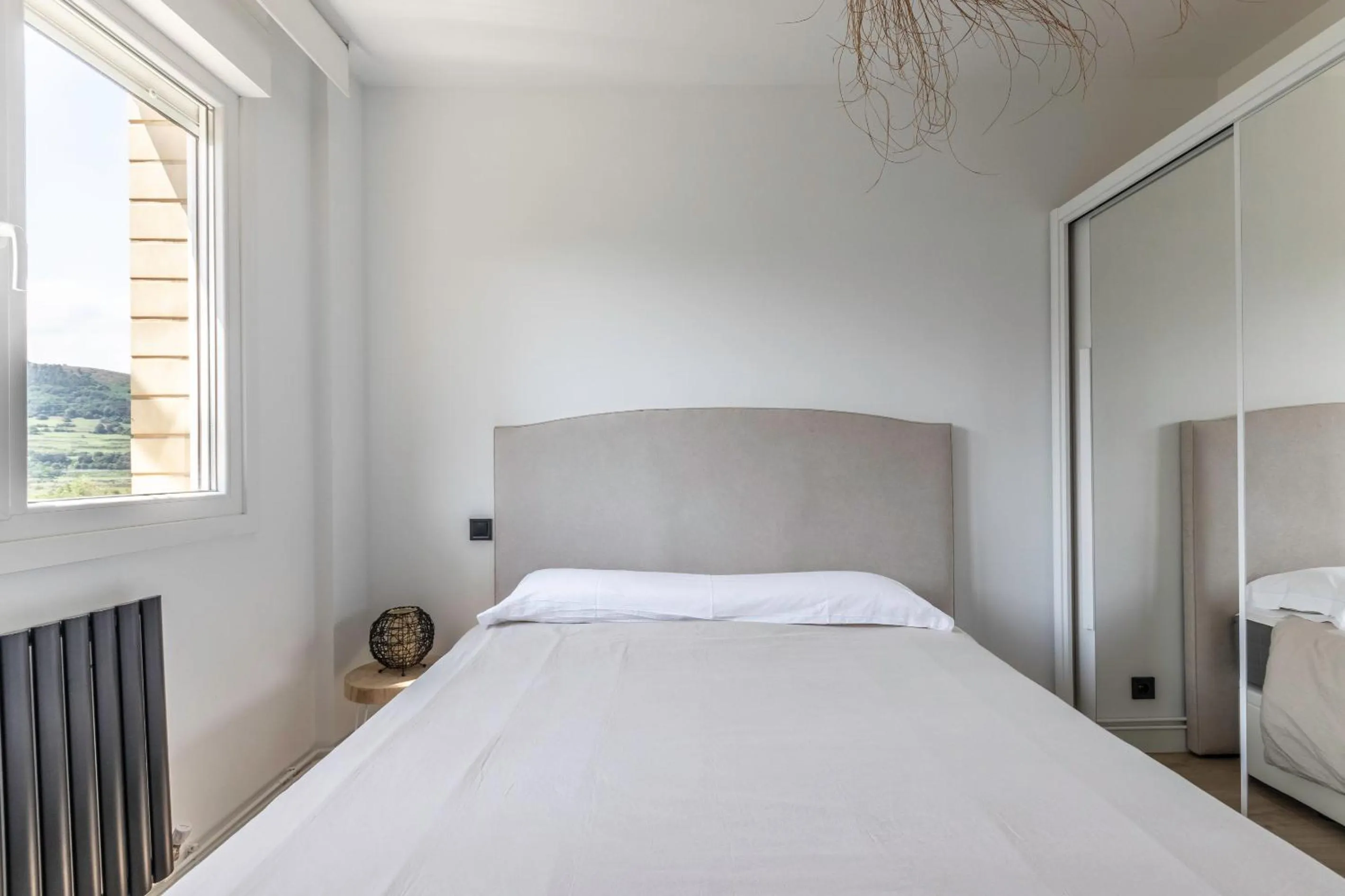 Bedroom in La Arena Apartamentos Zierbena