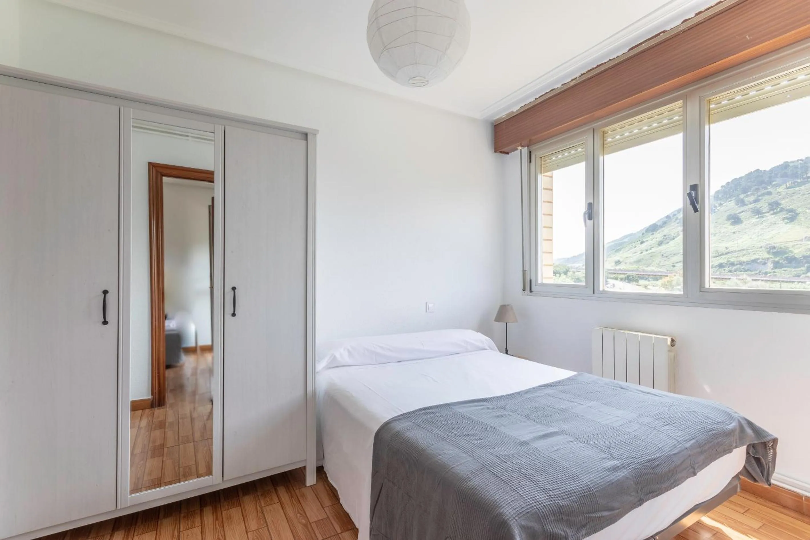 Bed in La Arena Apartamentos Zierbena