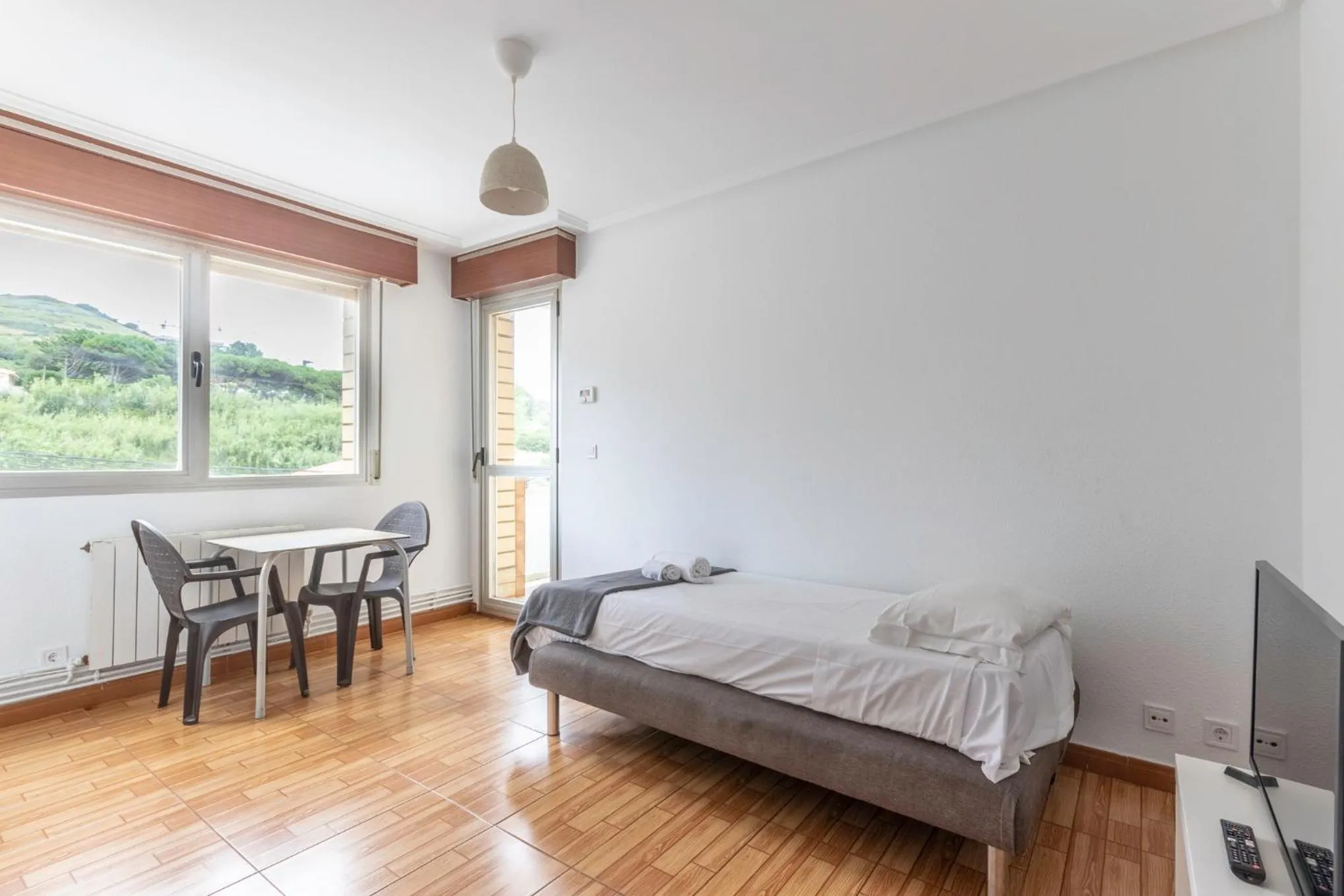 Bed in La Arena Apartamentos Zierbena