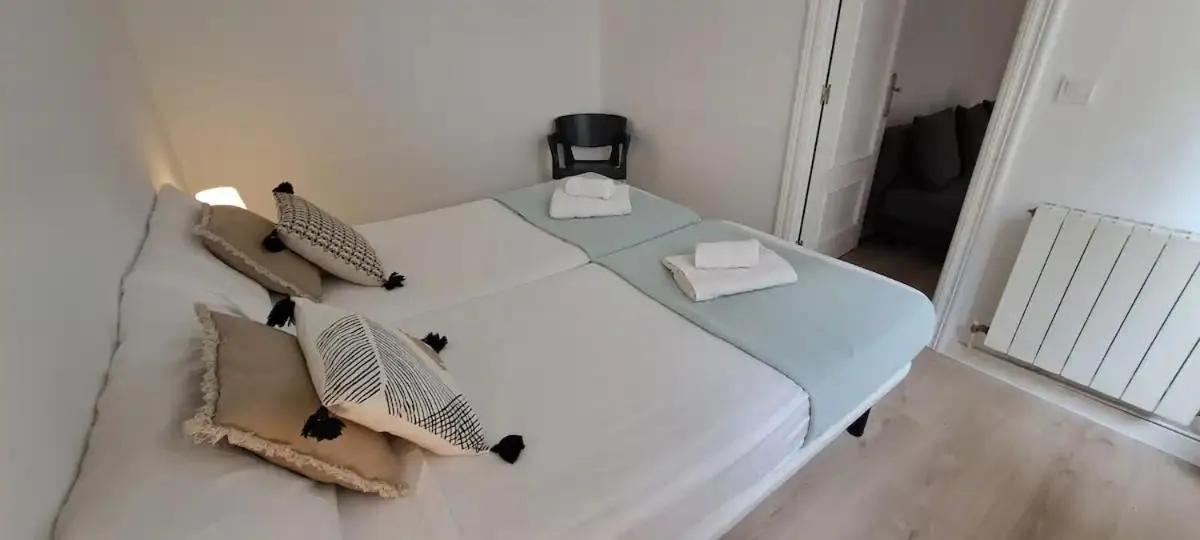 Bed in La Arena Apartamentos Zierbena