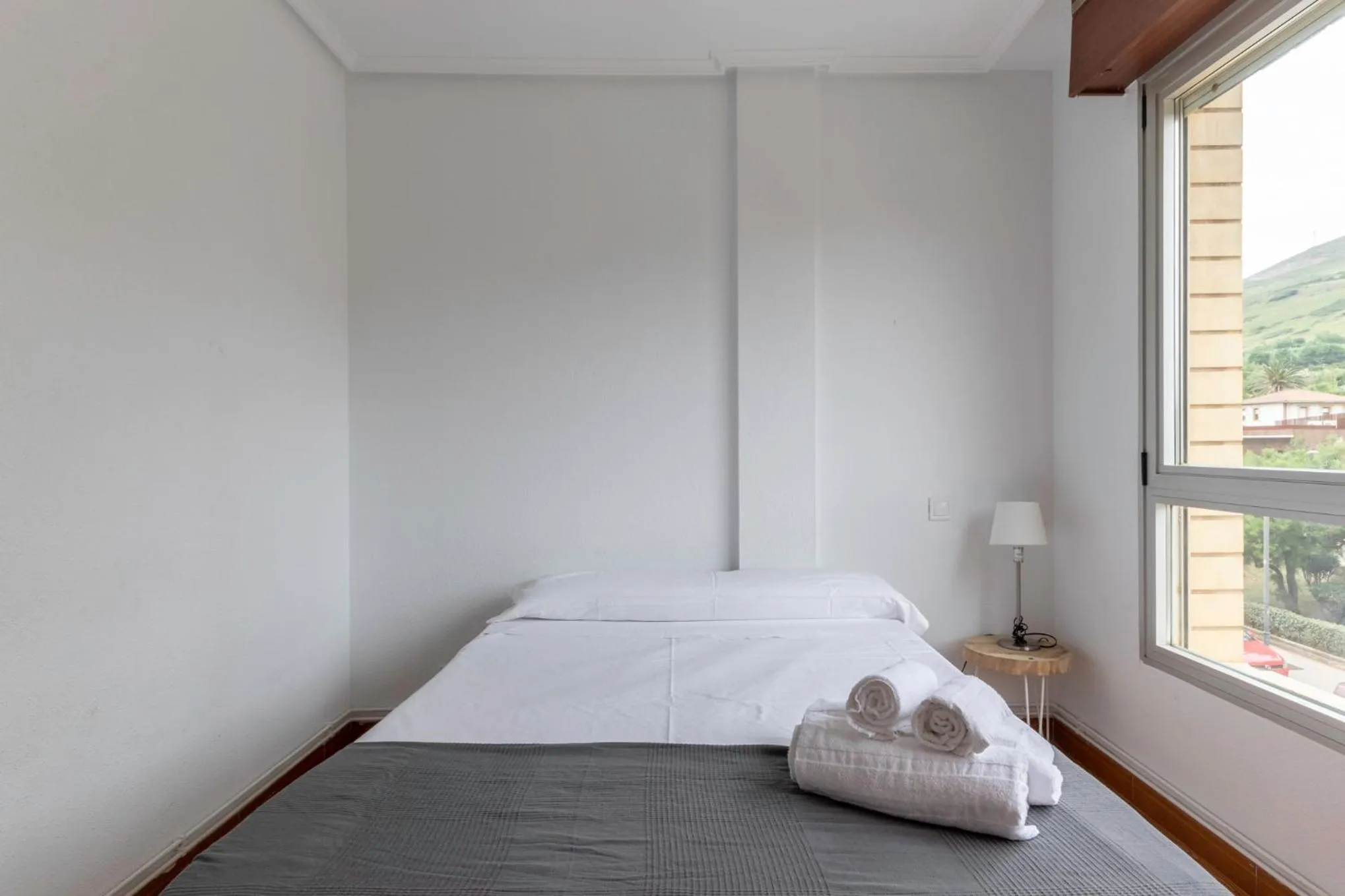 Bed in La Arena Apartamentos Zierbena