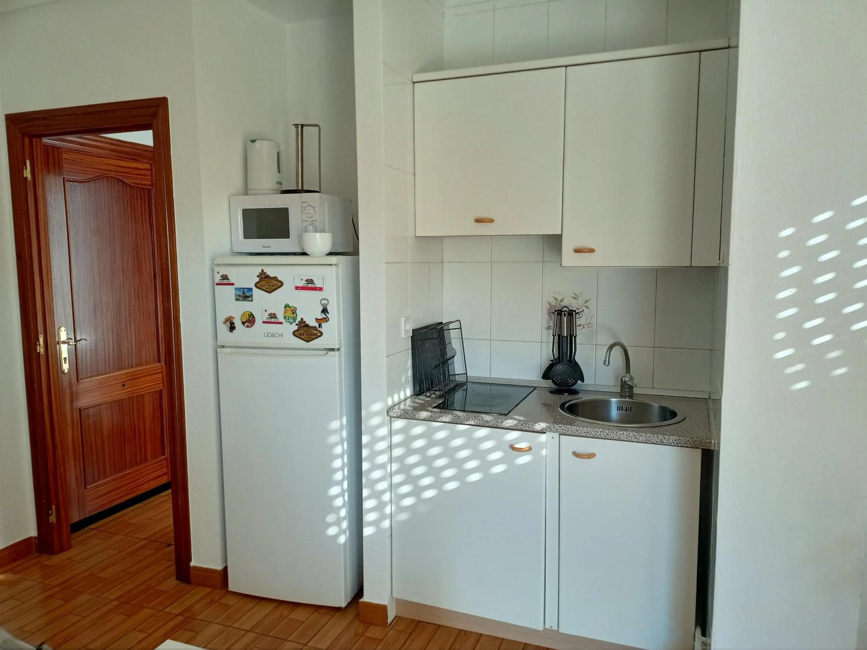 Kitchen or kitchenette in La Arena Apartamentos Zierbena