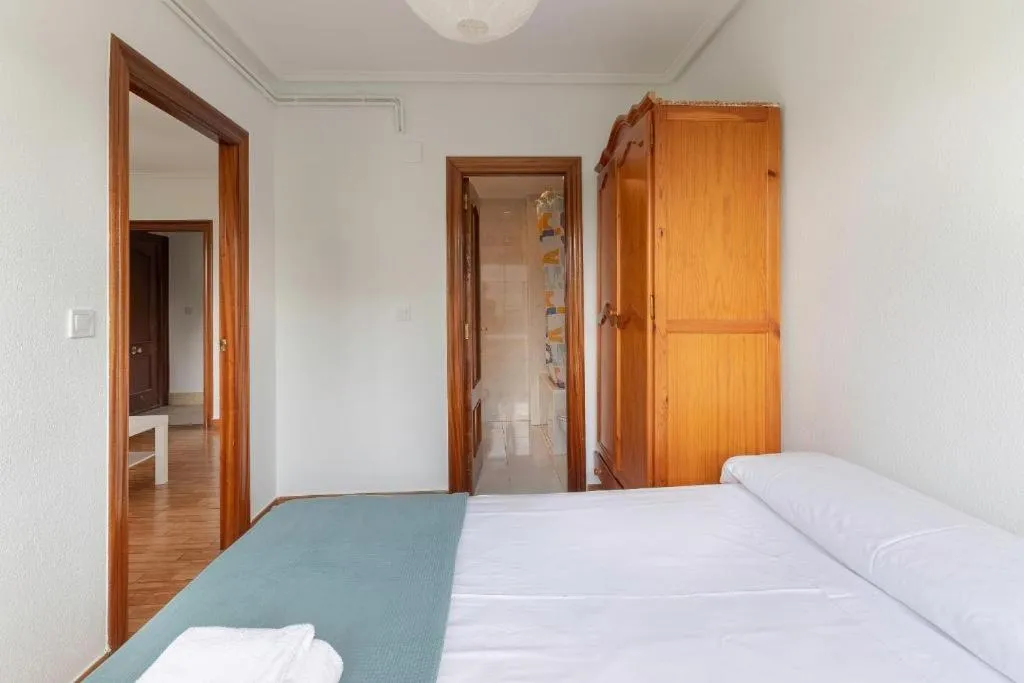 Bed in La Arena Apartamentos Zierbena