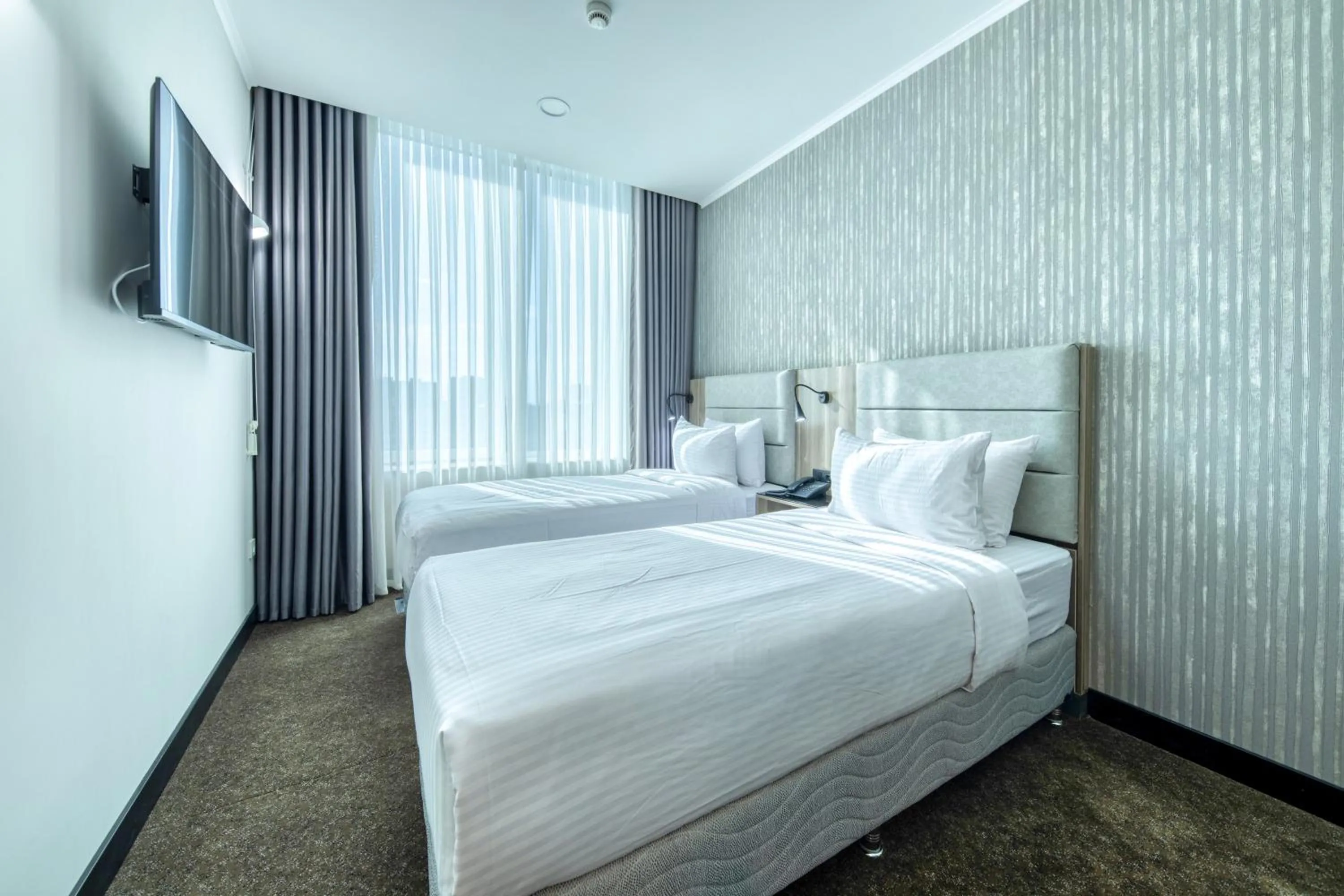 Bedroom, Bed in Expocore Hotel