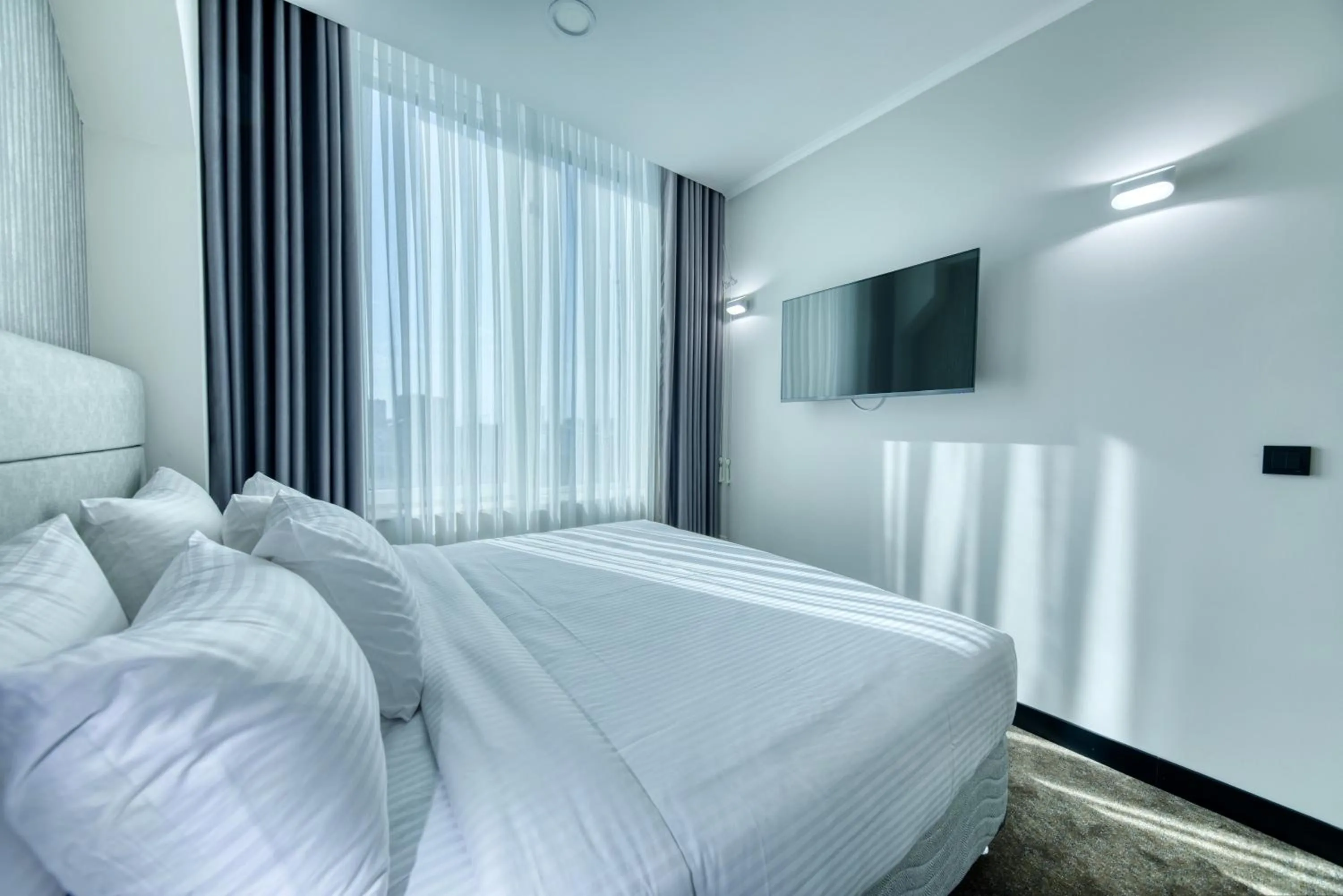 Bed in Expocore Hotel