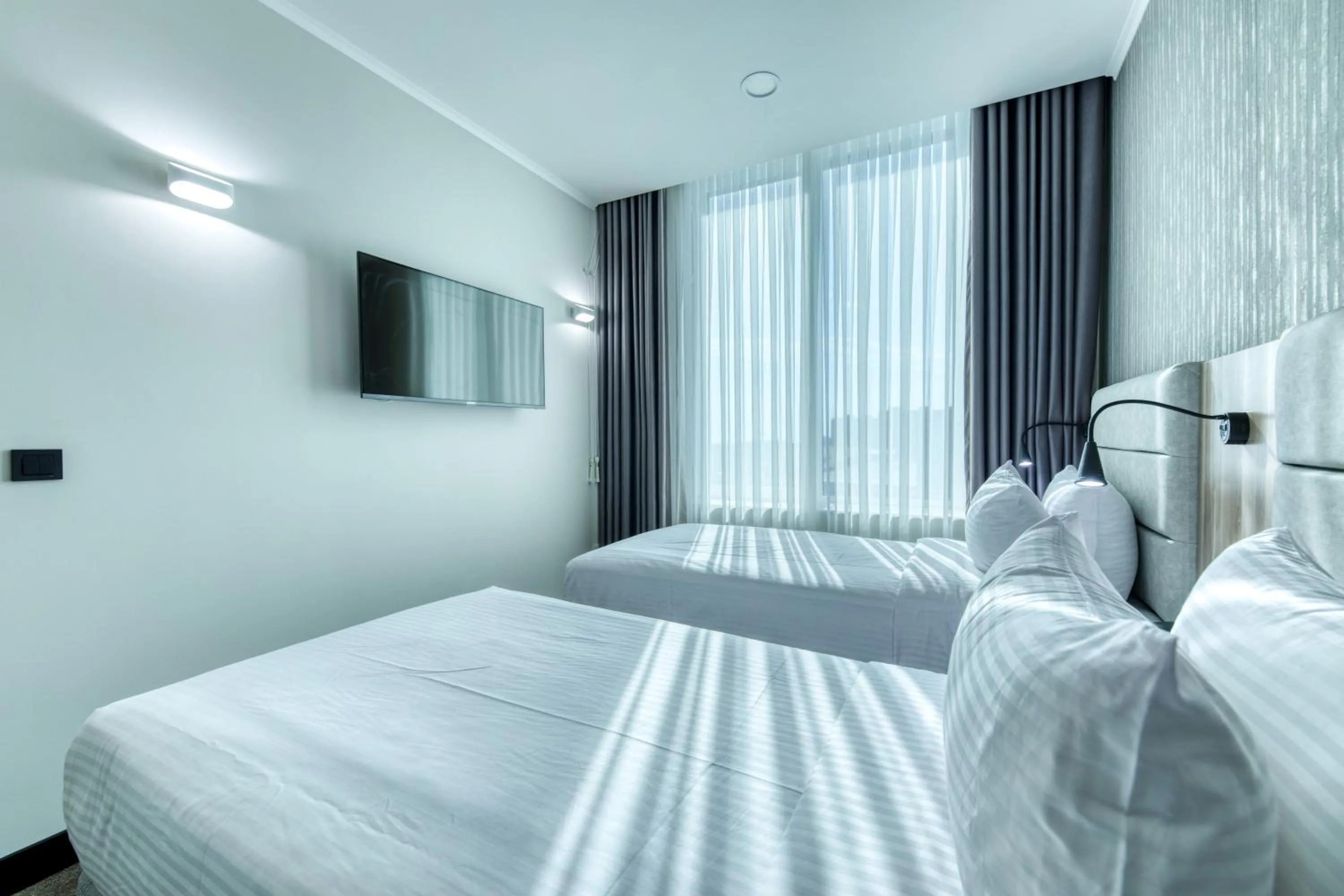 Bedroom, Bed in Expocore Hotel