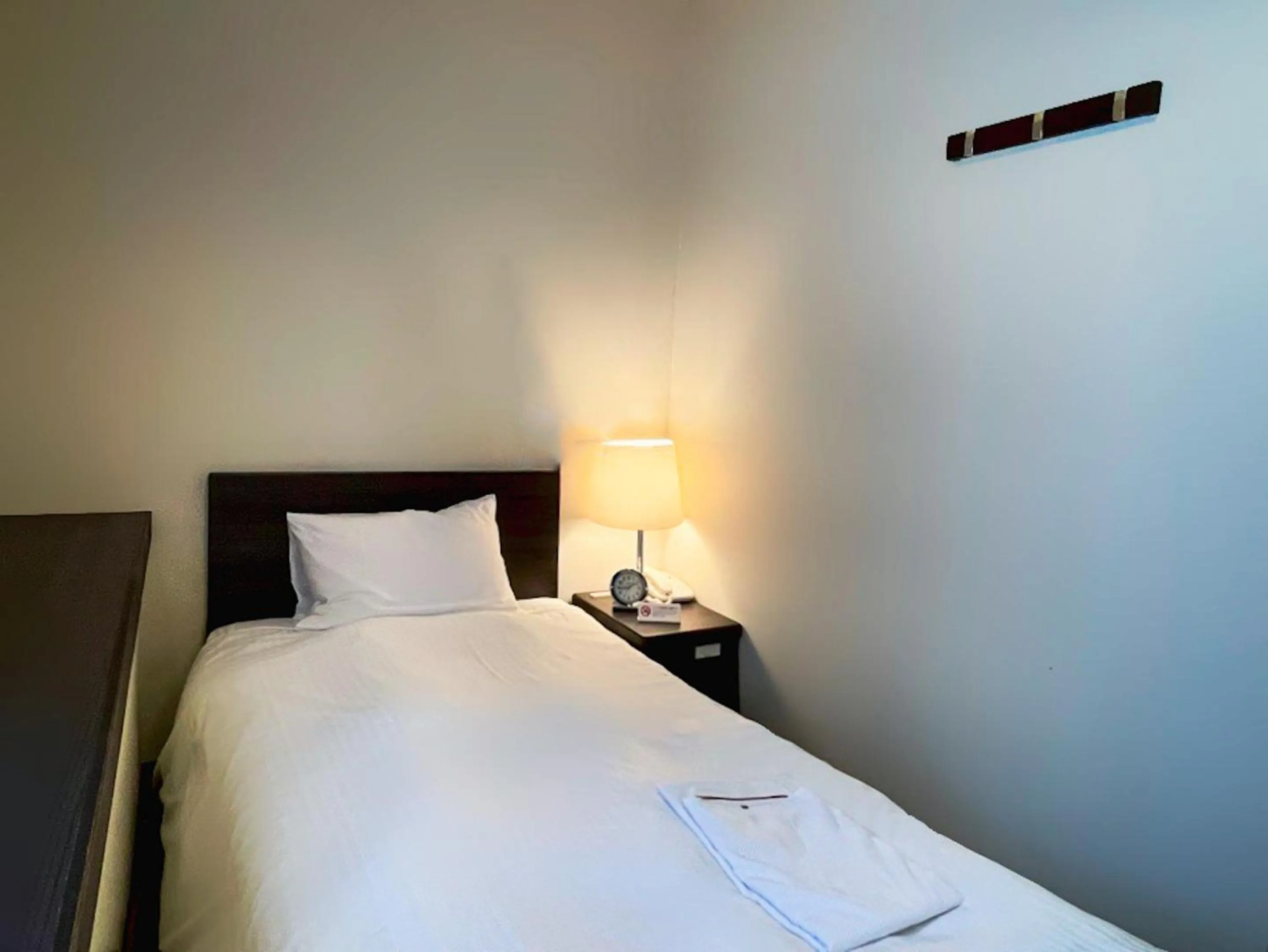 Bed in Shinjuku Sun Park Hotel