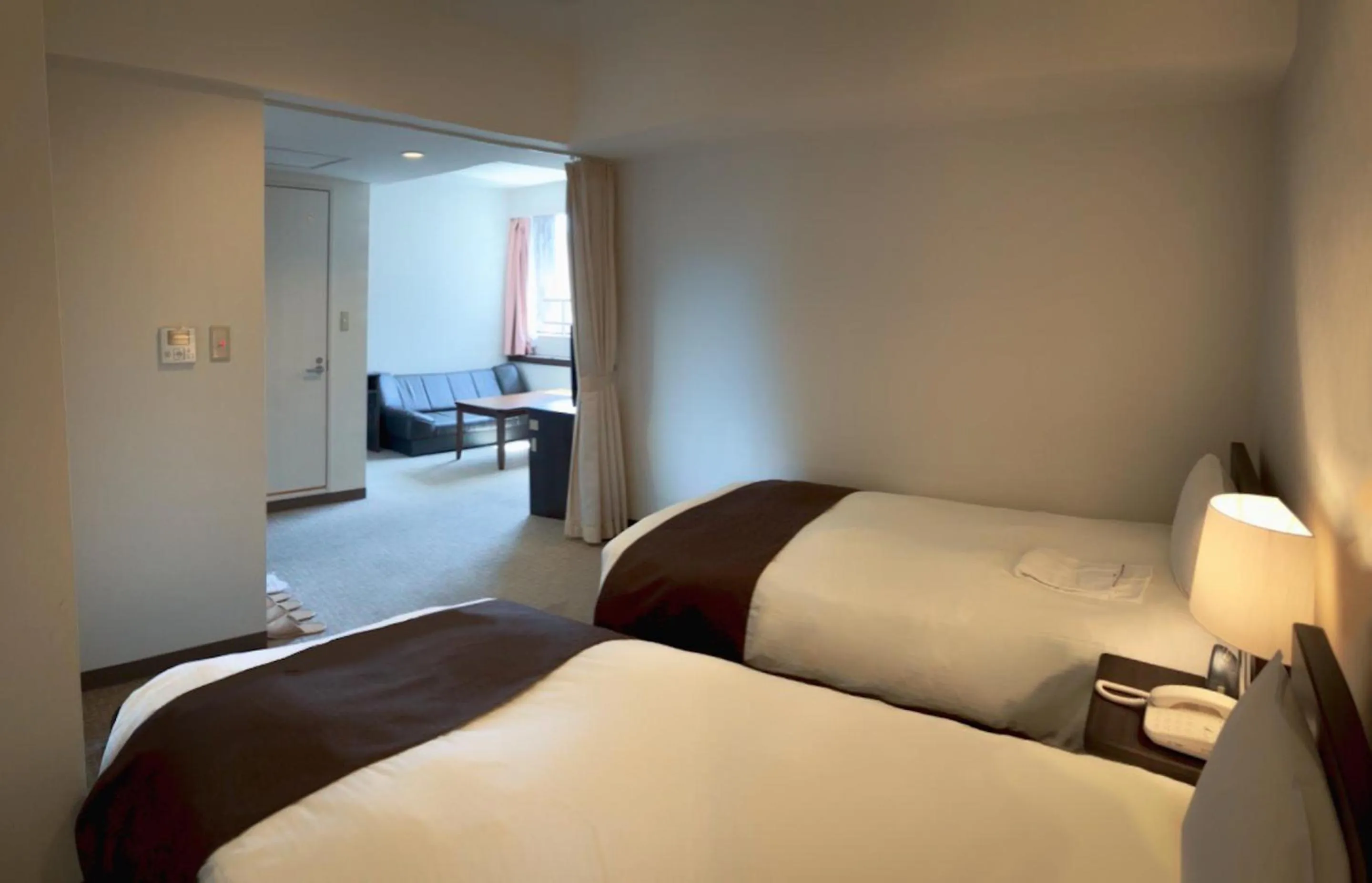 Bed in Shinjuku Sun Park Hotel