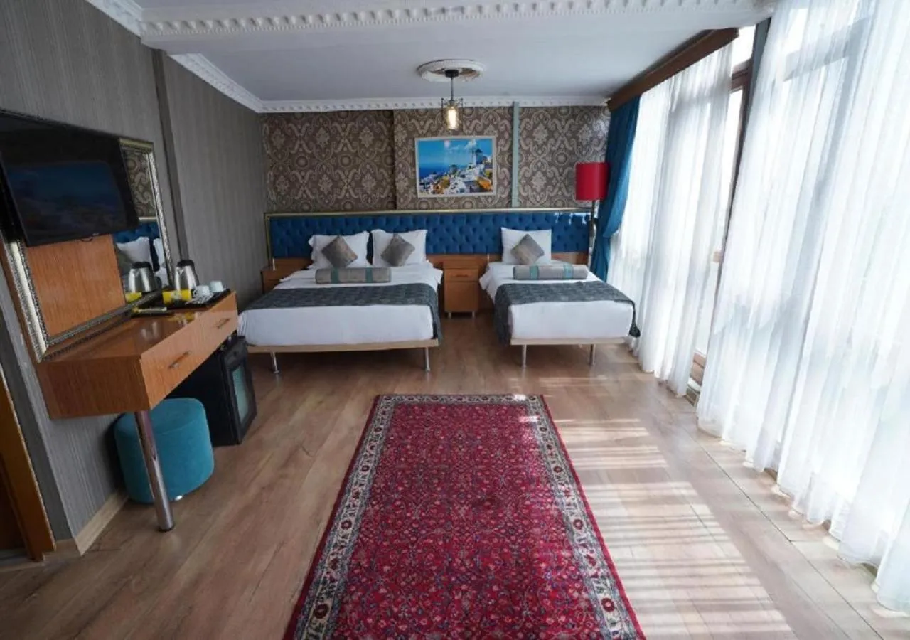 Bed in GOLDEN PALACE SEA ViEW