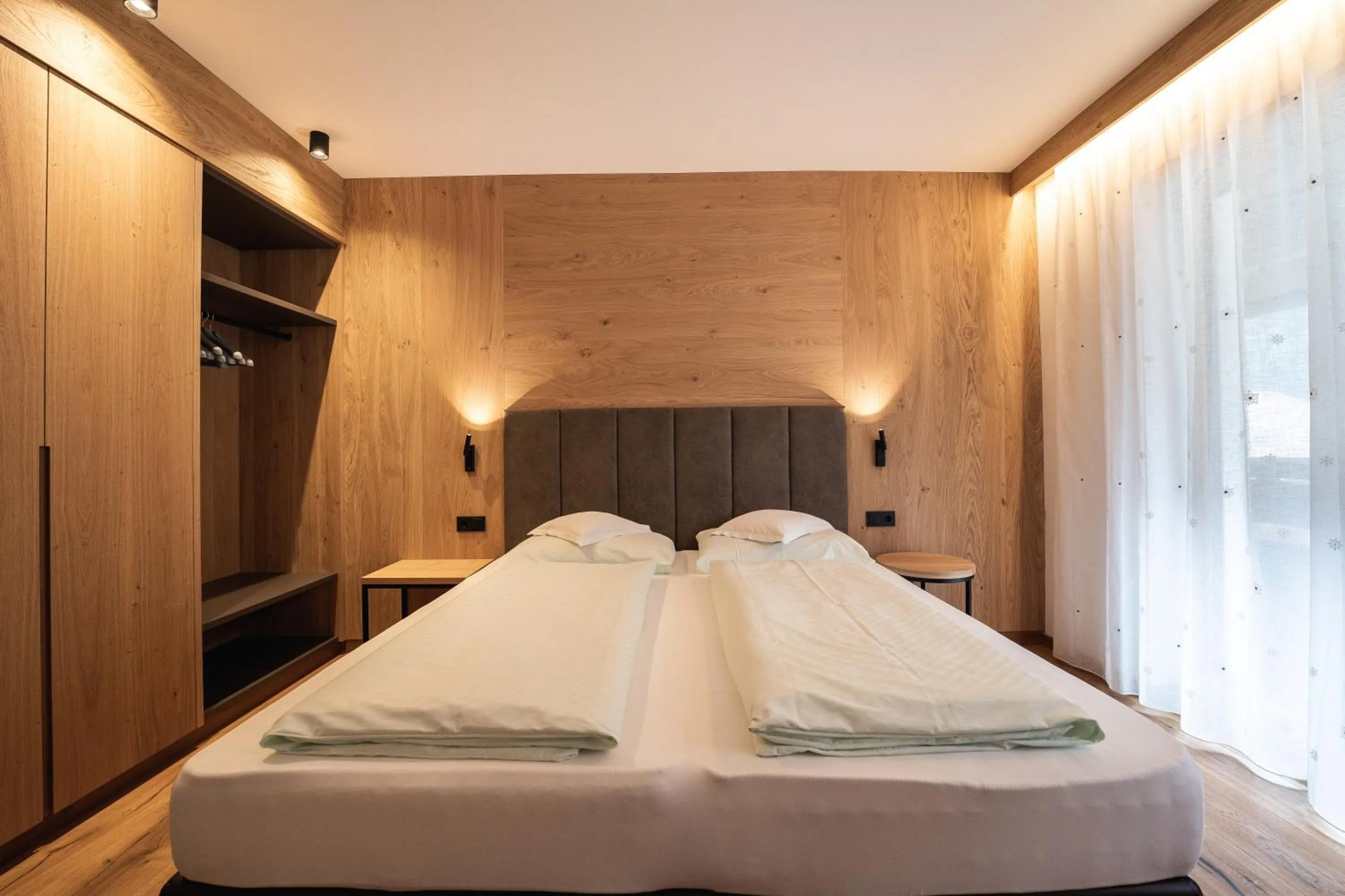 Bed in Aparthotel Zum Schlössl