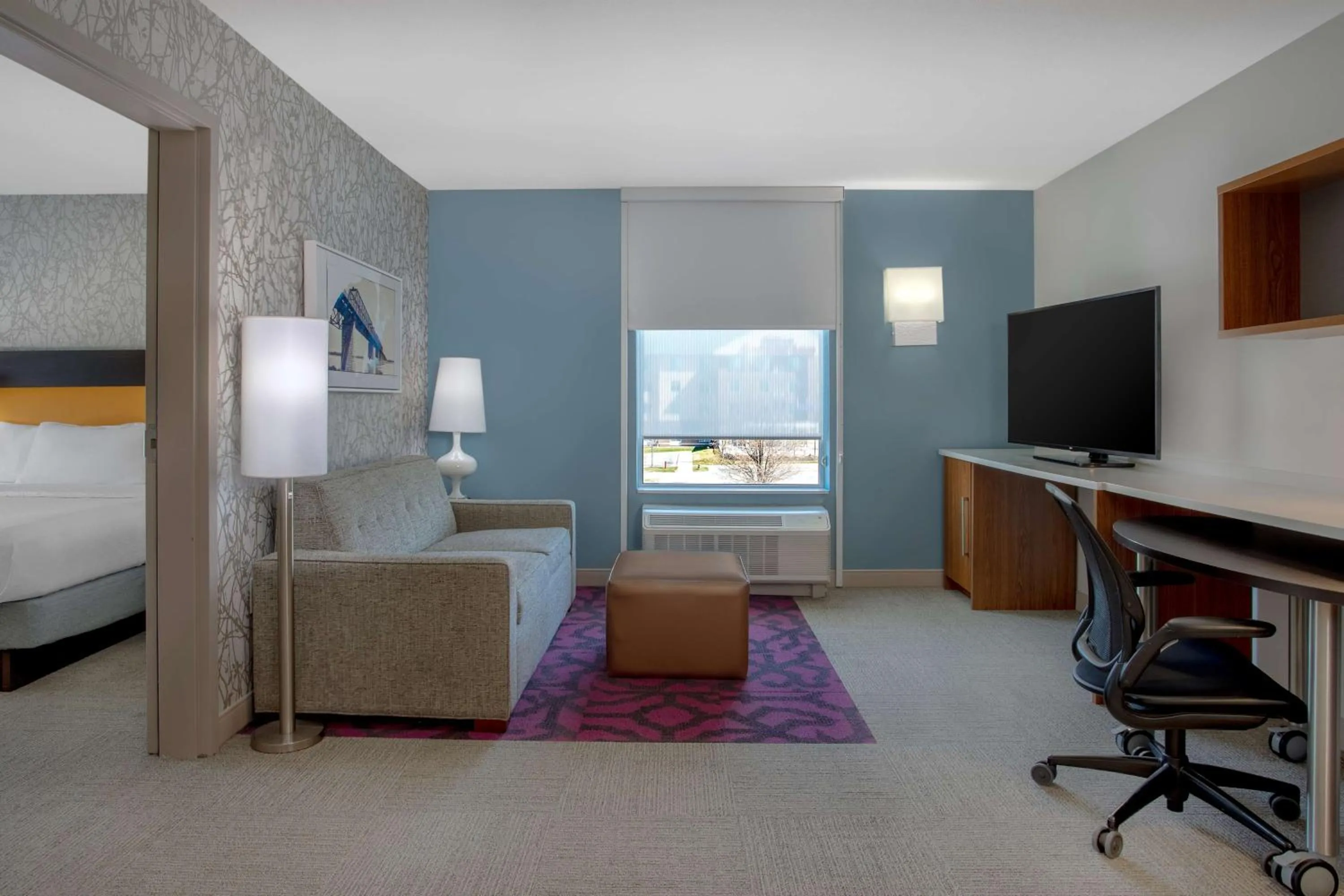 Living room, Bed in Home2 Suites By Hilton Omaha West