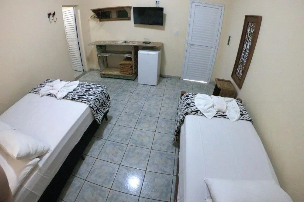 Photo of the whole room, Bed in Pousada Tia Nena