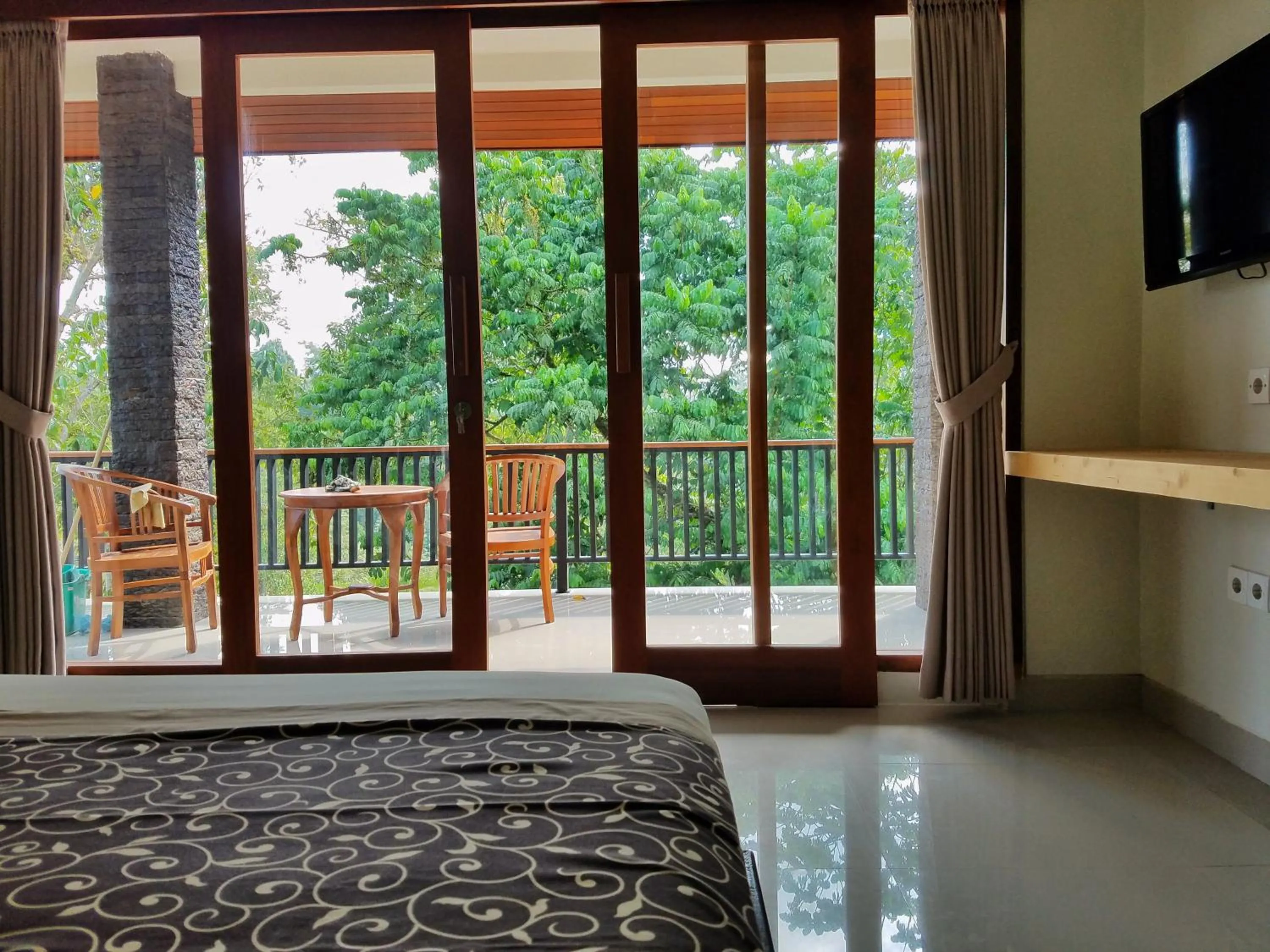 Bed in Angsoka Bungalow