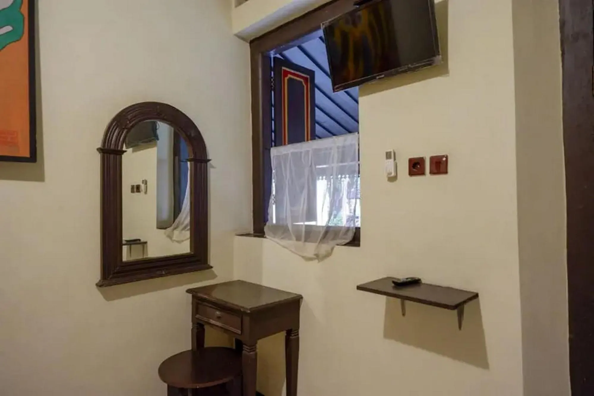 Bedroom in Cakra Homestay Solo Mitra RedDoorz