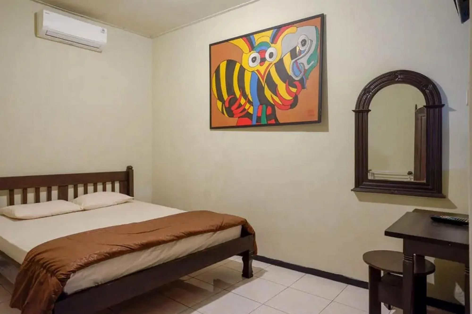 Bed in Cakra Homestay Solo Mitra RedDoorz