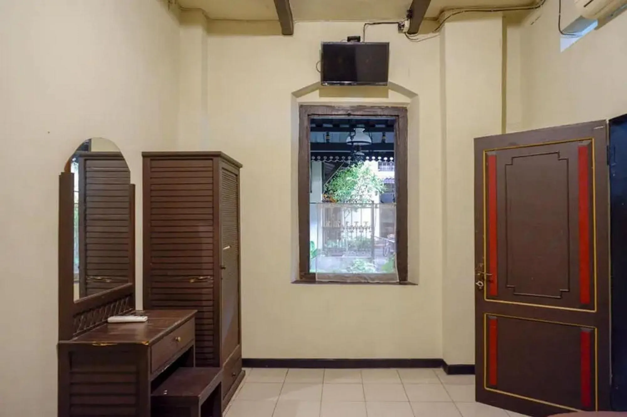 Bedroom in Cakra Homestay Solo Mitra RedDoorz