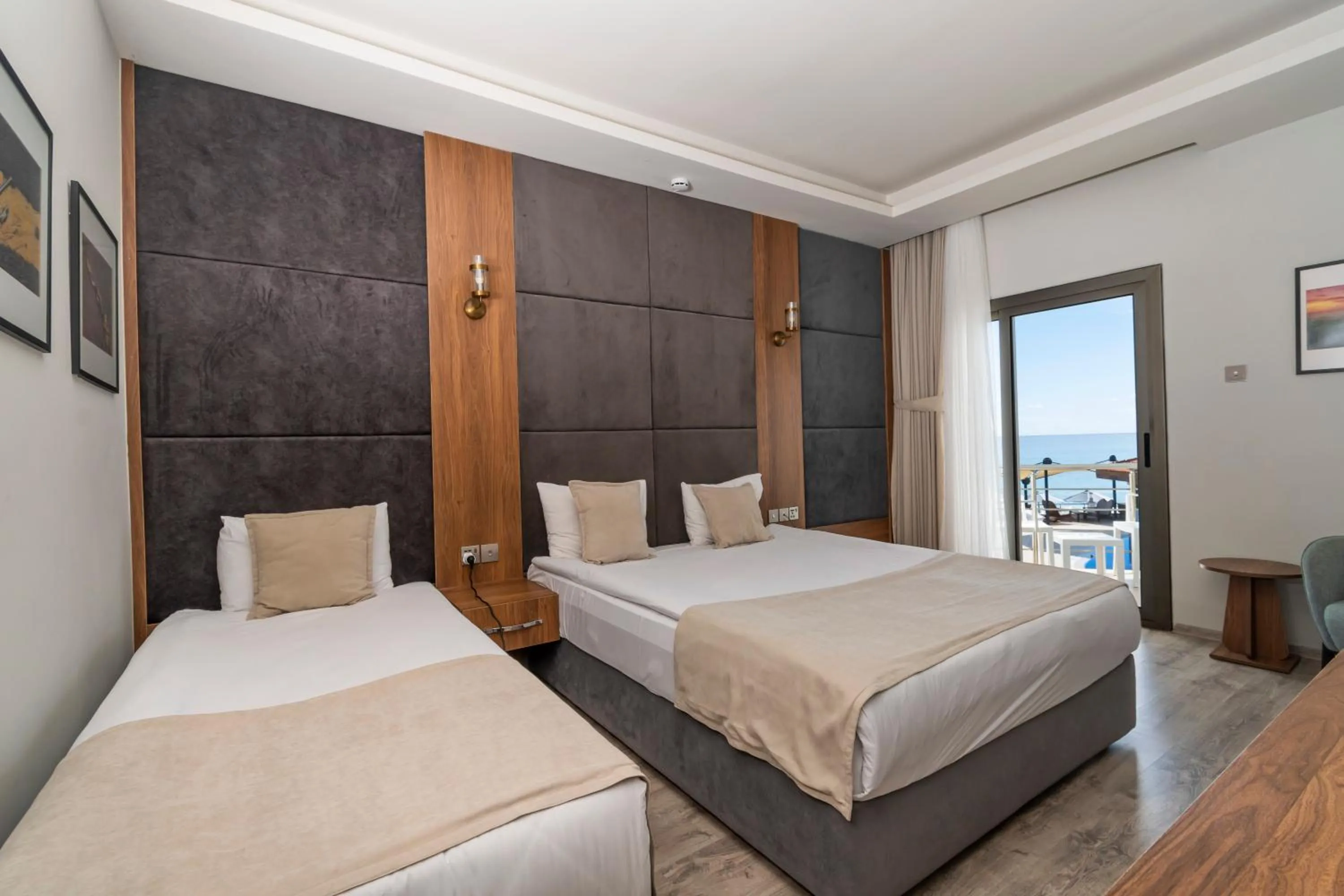 Bed in Mimoza Beach Hotel