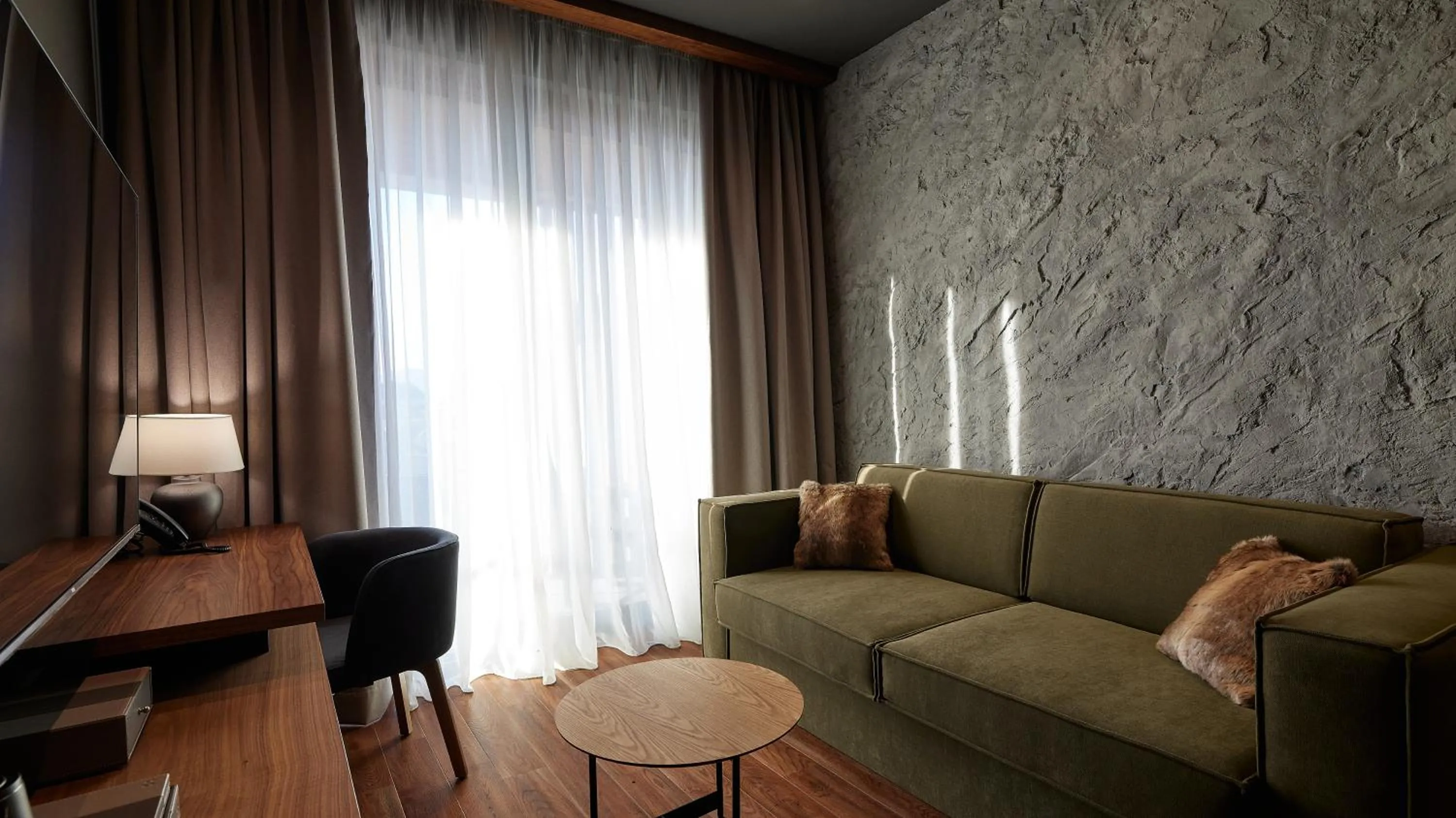 Living room in Bor Hotel by Karisma