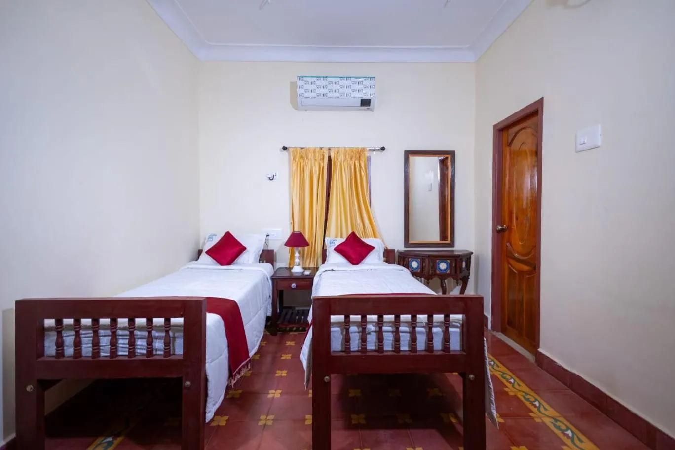 Bed in CHETTINAD HERITAGE WELLNESS RESORTS