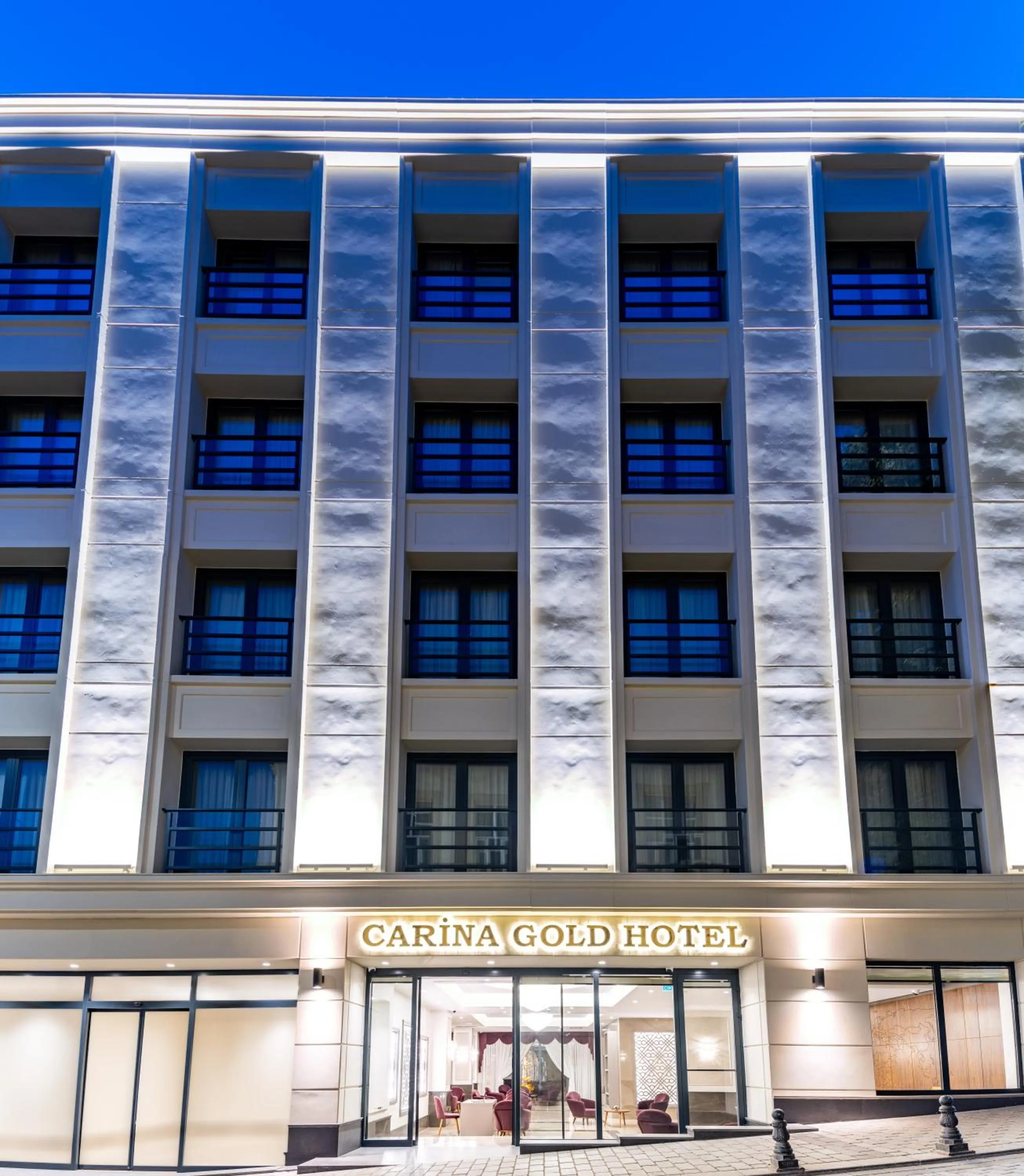 Property building in Carina Gold Hotel And Restaurant