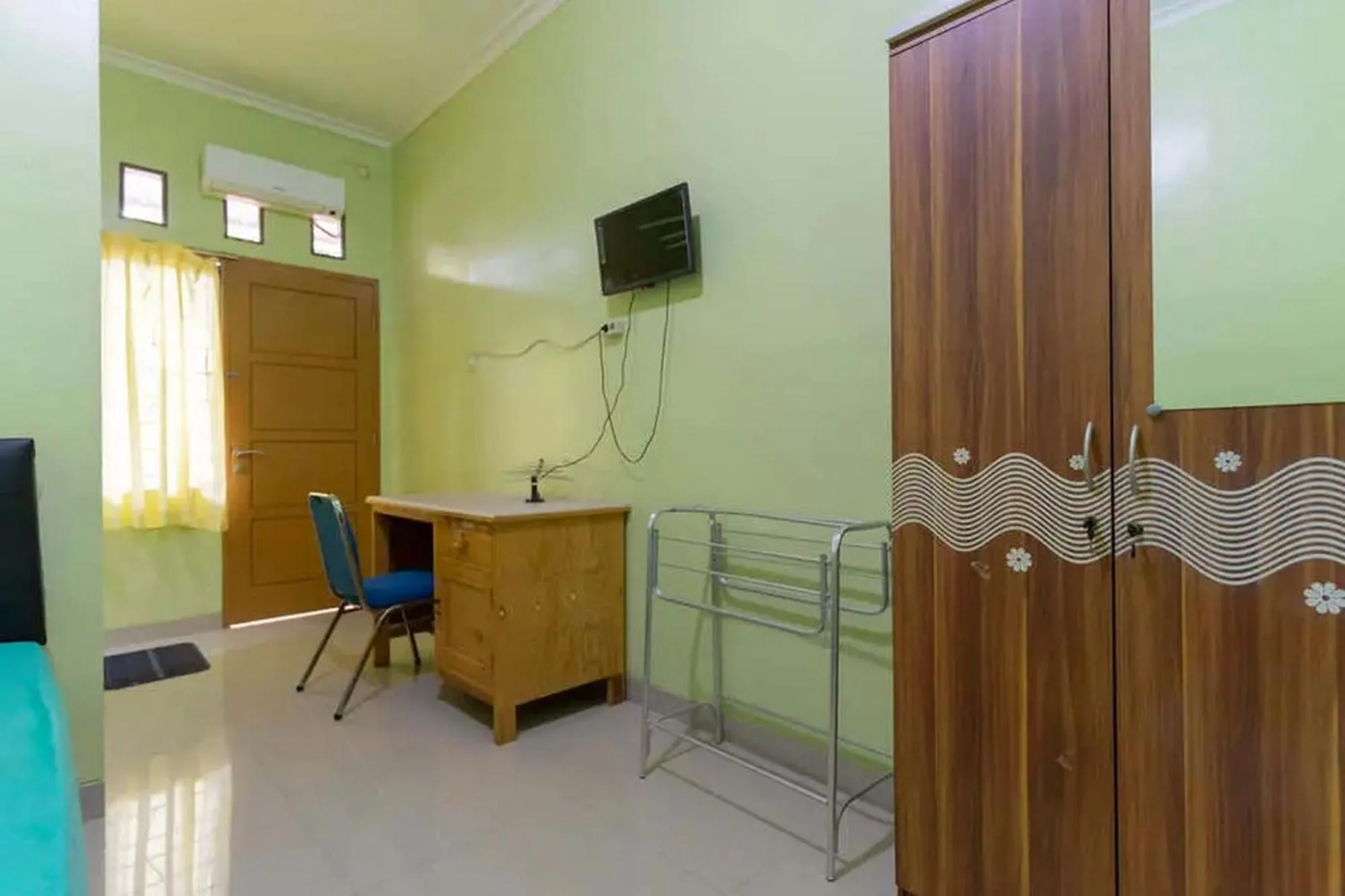 TV and multimedia in Kostawira Syariah Bintaro Mitra RedDoorz