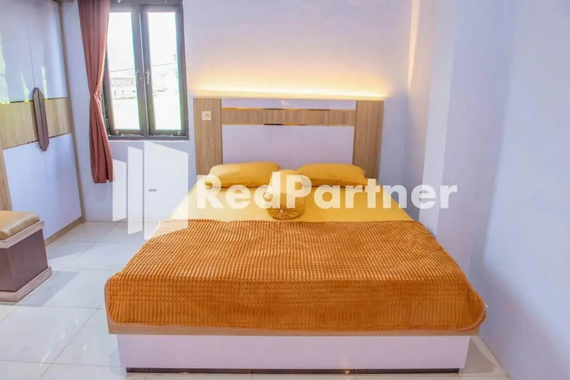 Bed in Hotel Rai's Palopo Exclusive Mitra RedDoorz