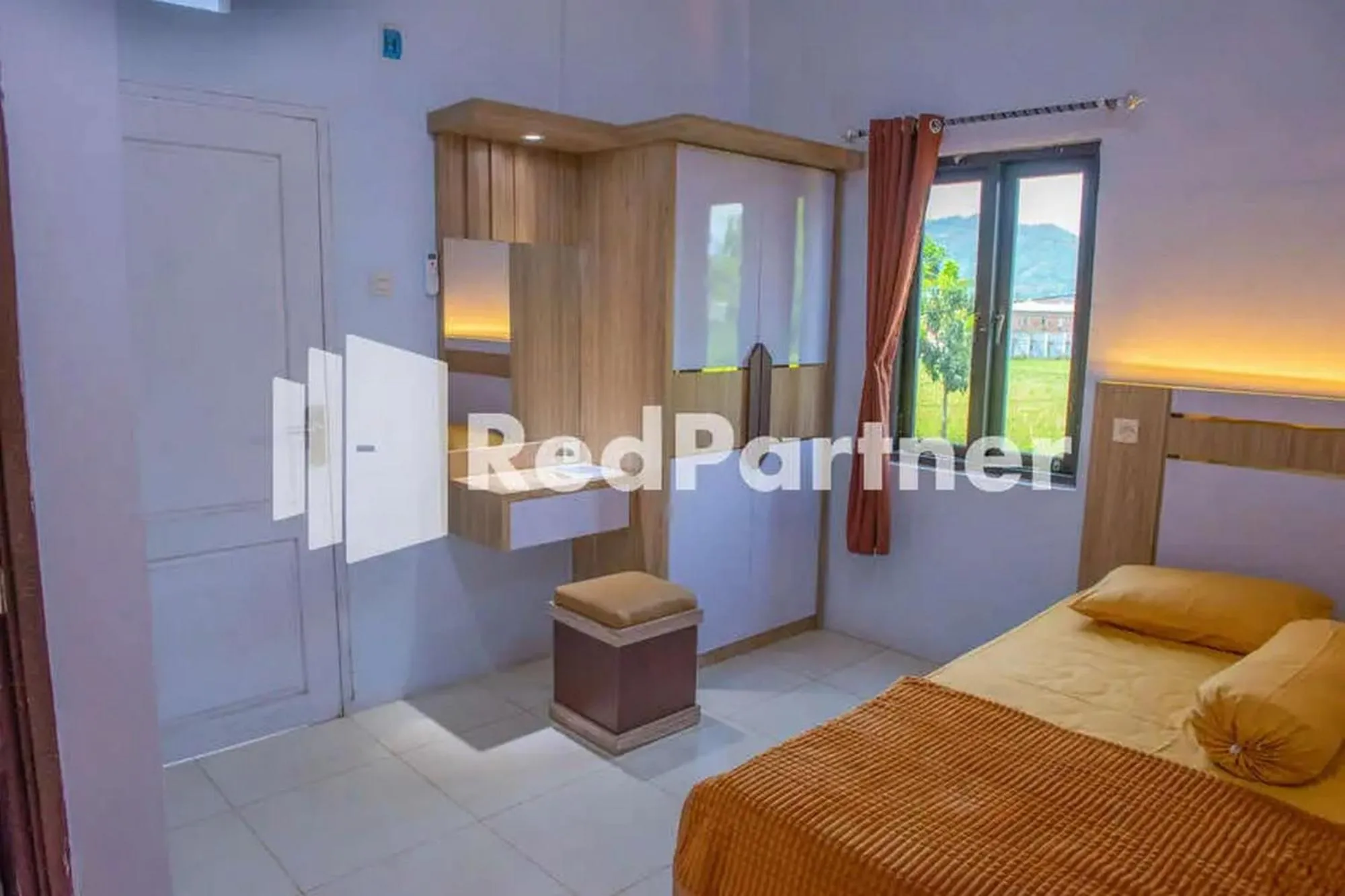 Bed in Hotel Rai's Palopo Exclusive Mitra RedDoorz