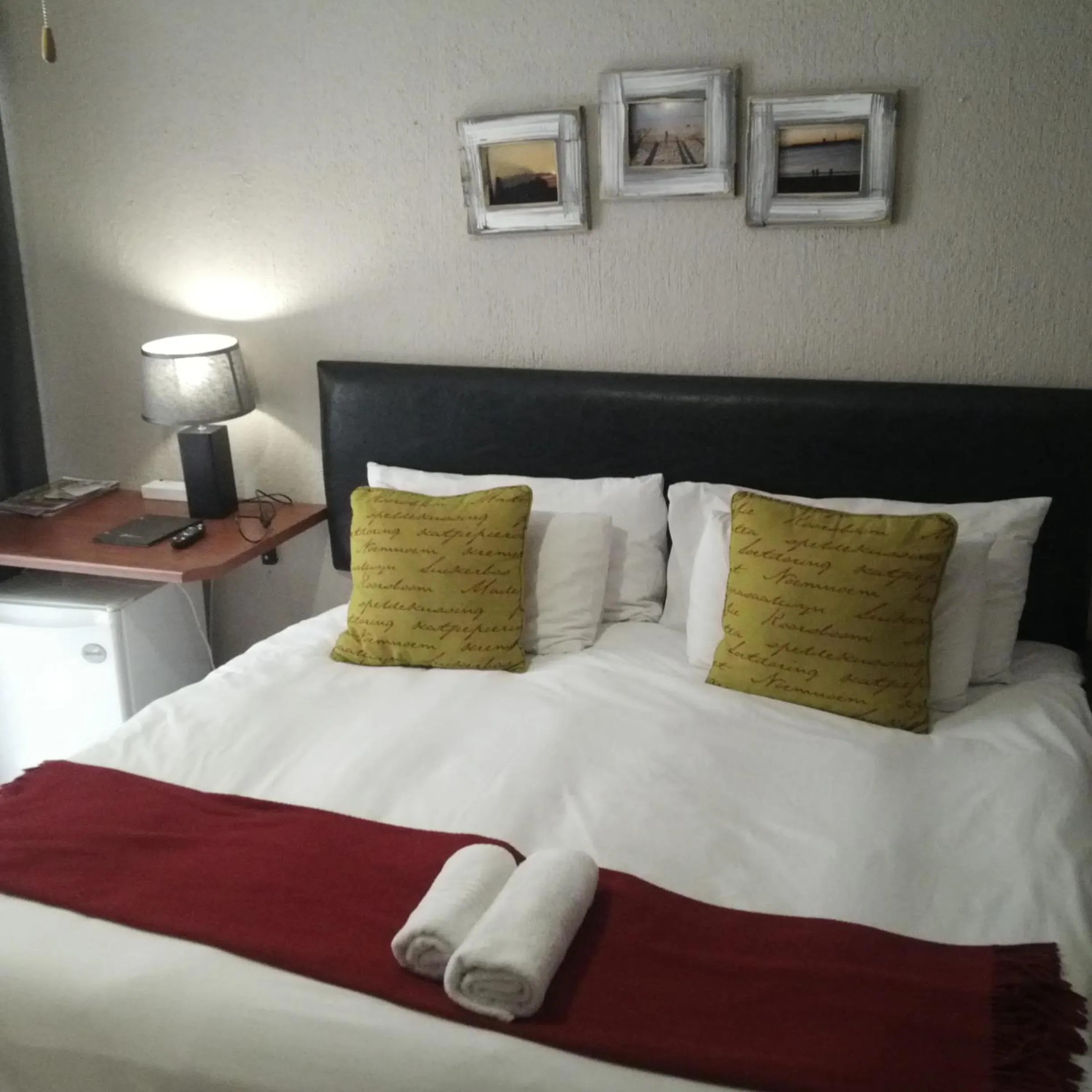 Bed in Zebrina Guest House