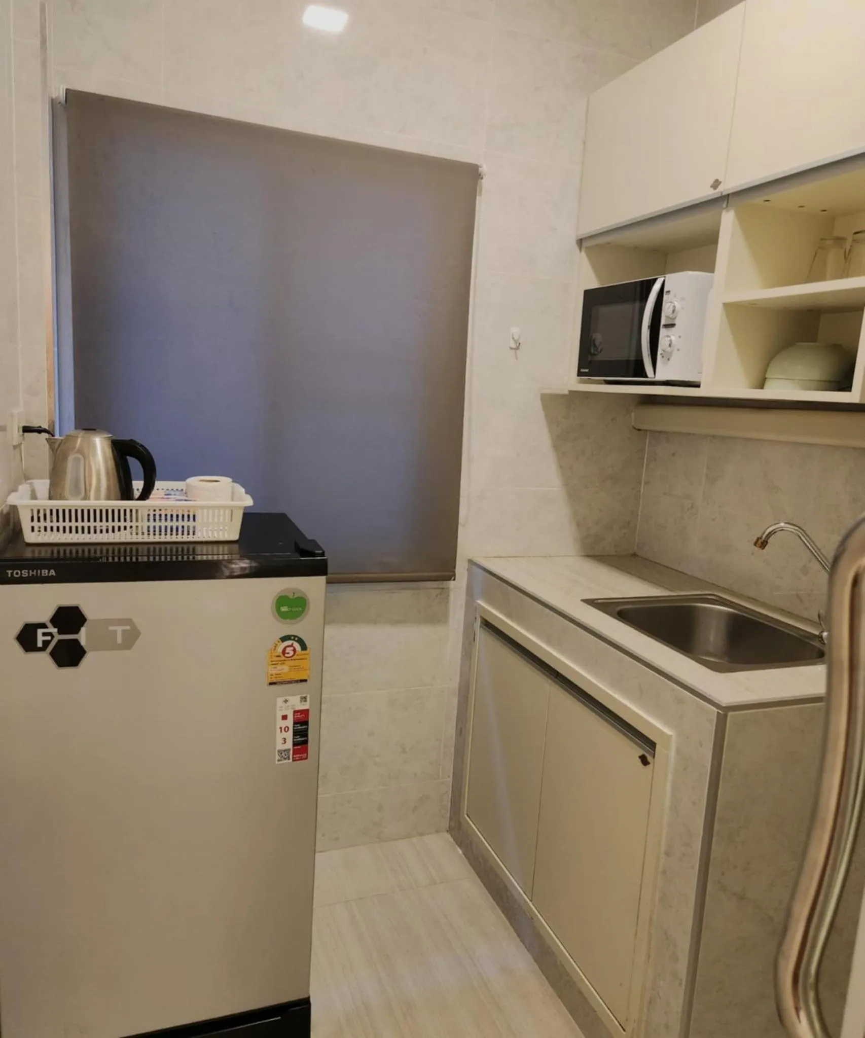 microwave in S.P.C Apartment by Brodderud