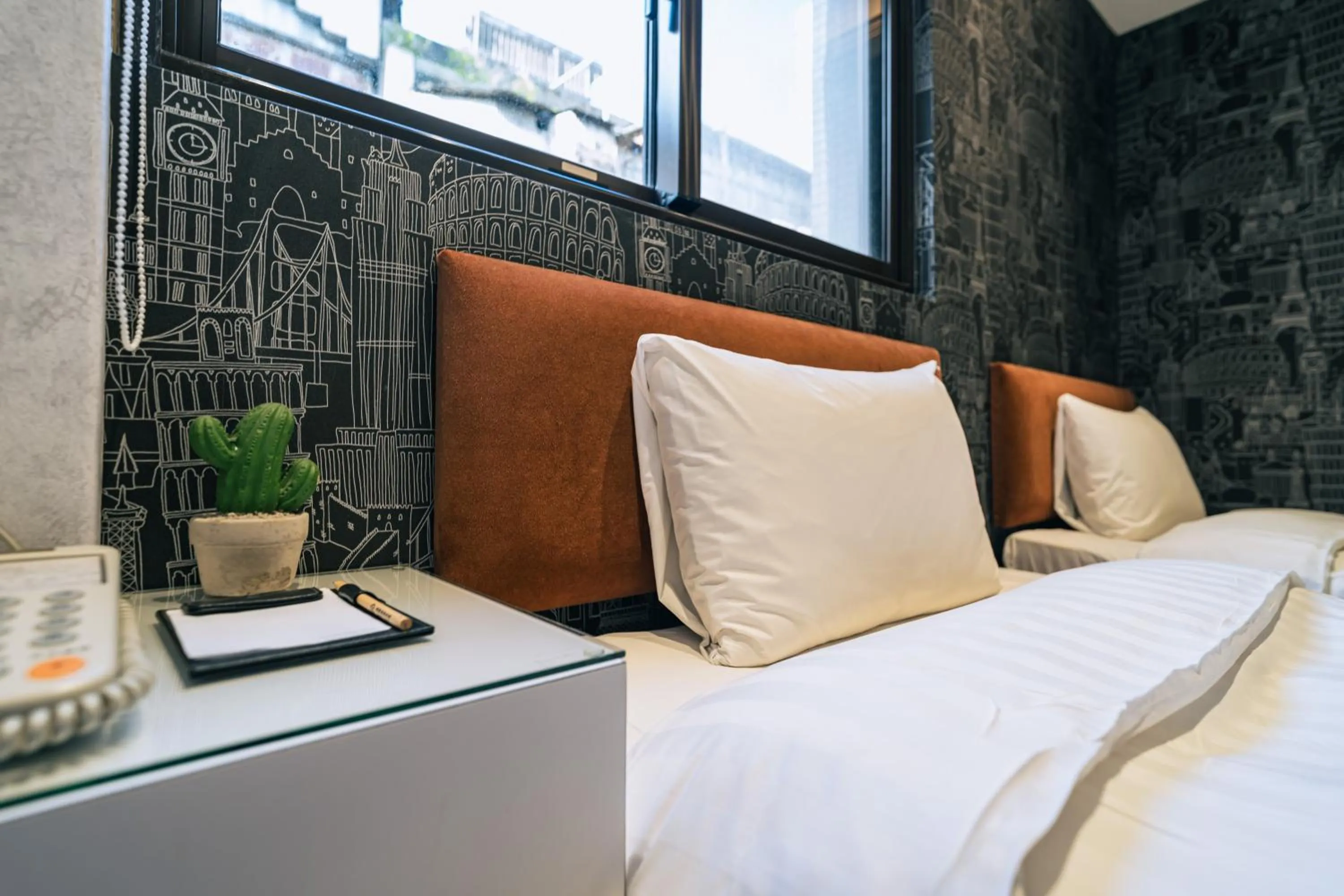 Bed in Hotel Puri Taipei Station Branch